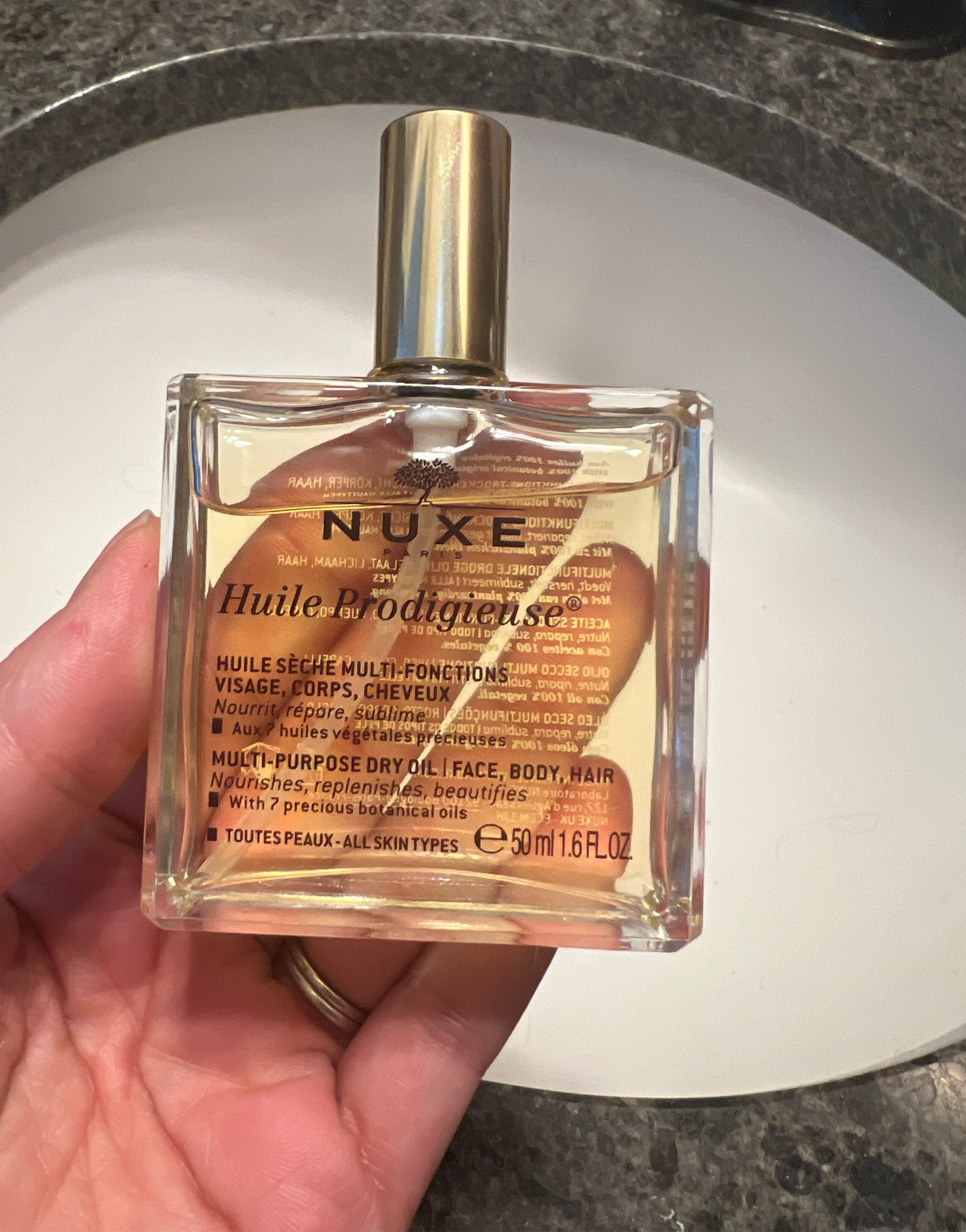 French skincare. This is an inexpensive, must have dry oil for face and hair. I use it as a last step to seal in moisture on my face as well as applying it to the ends of my hair. A multi use product that I can’t live without! #skincare

#LTKbeauty #LTKfindsunder50