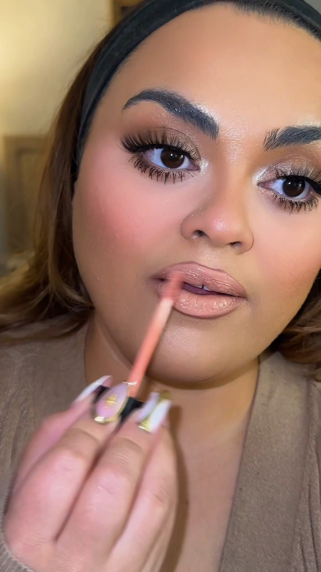 Keeping it classic with my signature nude lip! Perfectly balanced, effortless, and goes with every look—there’s just something about a good nude that never fails. 💄✨ Shop my go-to shades on LTK and find your new everyday favorite! #NudeLipEssentials #LTKBeauty #GabrielaLascano 

#LTKCyberWeek #LTKBeauty #LTKHoliday