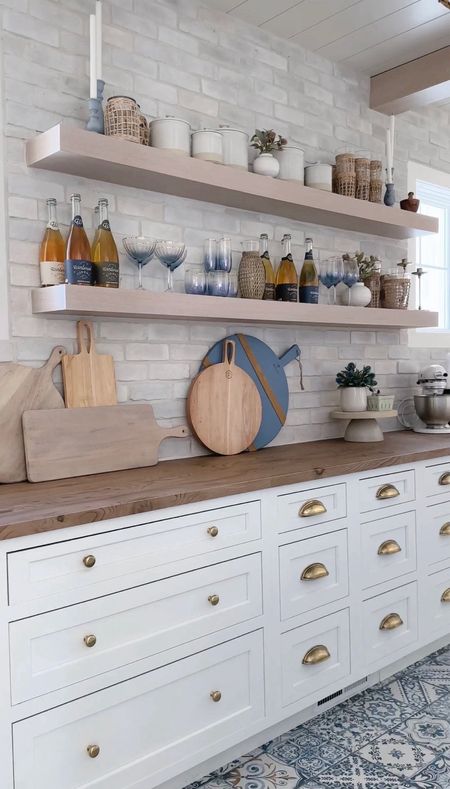 Pantry and kitchen shelf decor - Emtek brass cabinet hardware -Anthro glassware - charcuterie boards - seagrass rattan glassware and pitcher

#LTKhome