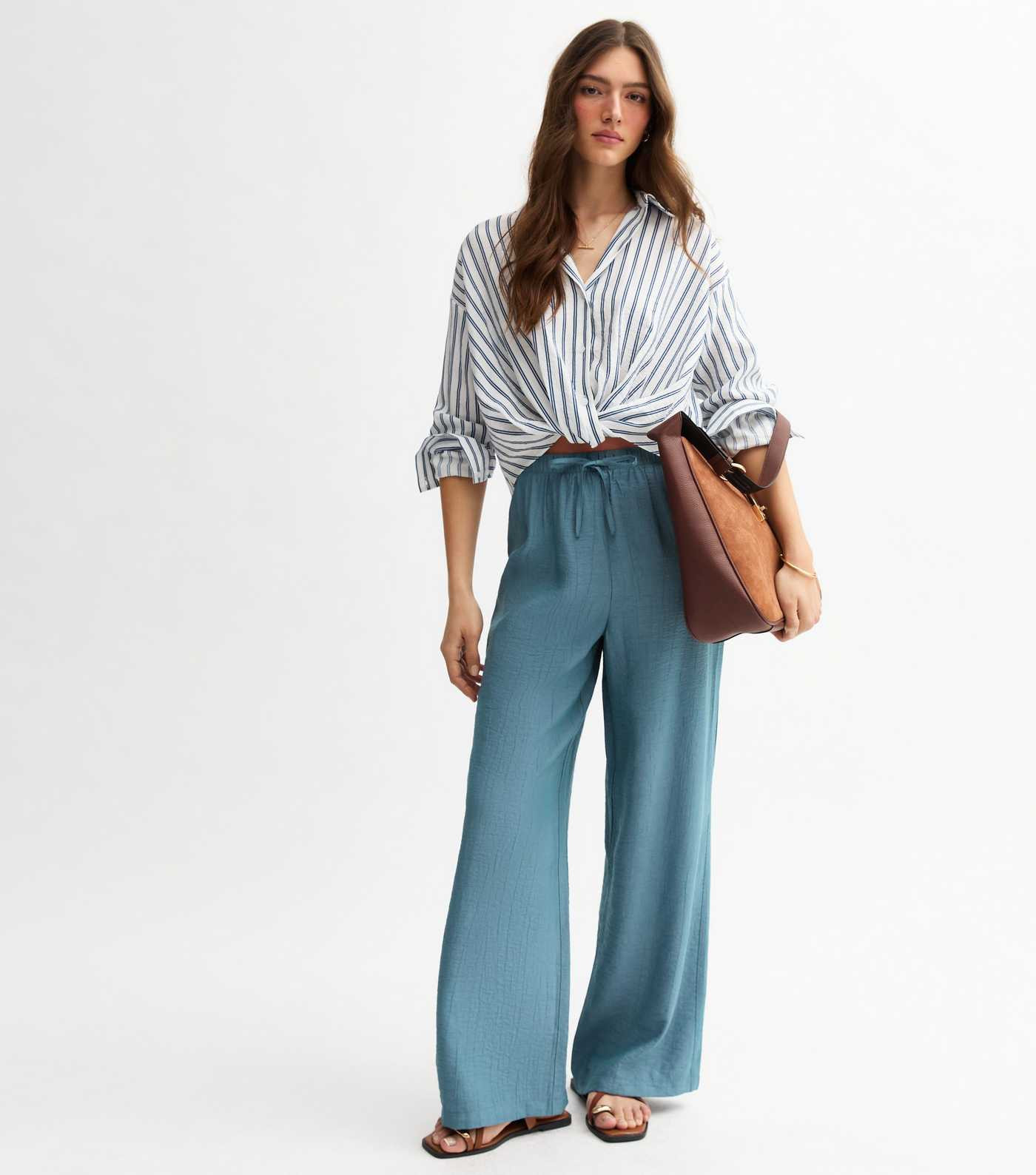 Blue Crinkled Wide Leg Trousers
						
						Add to Saved Items
						Remove from Saved Items | New Look (UK)