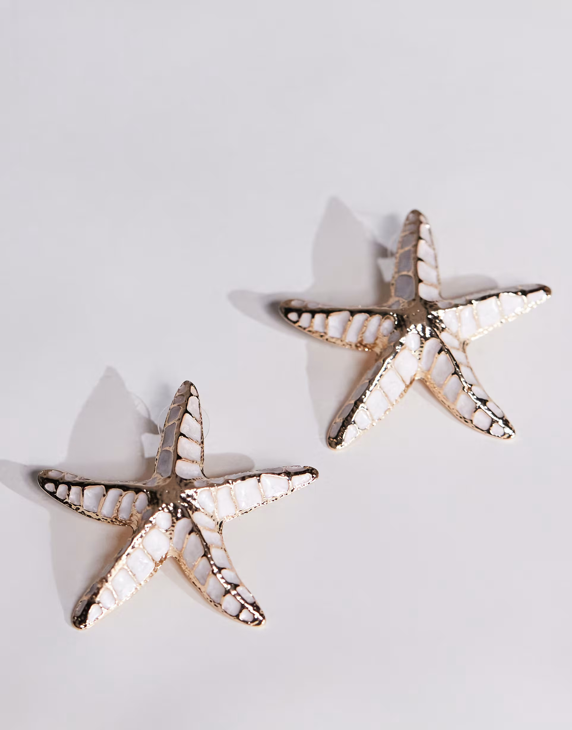 ASOS DESIGN stud earrings in starfish design with enamel detail in gold tone | ASOS (Global)