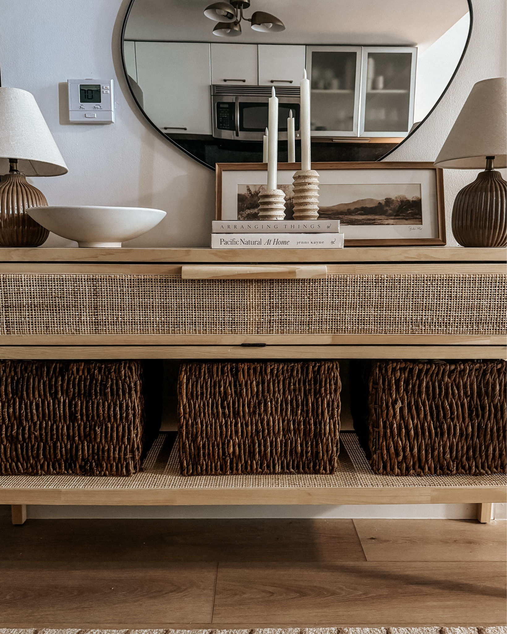 Subtle fall entryway styling - if you’re not into the fall stems, use warm tones and some fall ish art to create the autumn vibes subtly! Love this kind of seasonal decorating! 

The bowl and art are from last year so I linked similar available options for those! 

#LTKSeasonal #LTKHome #LTKStyleTip