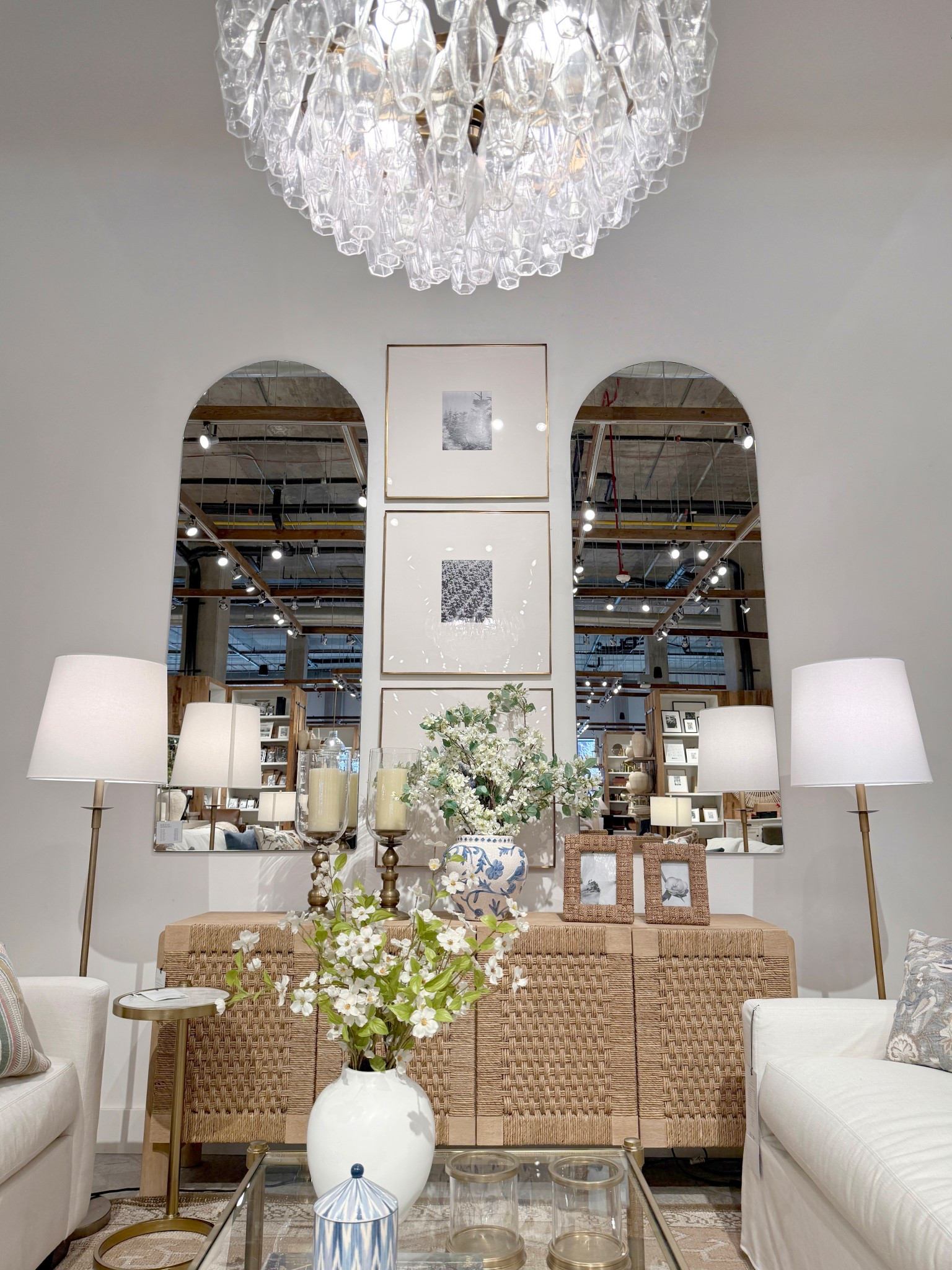 Elegant living room inspiration! 😍 The Bolinas Woven Buffet (75”) from Pottery Barn creates such a beautiful focal point with its woven texture and warm neutral finish. ✨ Styled here with two arched wall mirrors, a trio of gallery frames, soft florals, and subtle gold accents, the whole setup feels refined, layered, and thoughtfully curated. 🤍🌿 A timeless console moment that brings elegance and character to a living room or entryway. Linked the buffet and coordinating decor pieces to shop! 💫 #PotteryBarn #LivingRoomInspo #HomeDecor

#LTKSaleAlert #LTKHome
