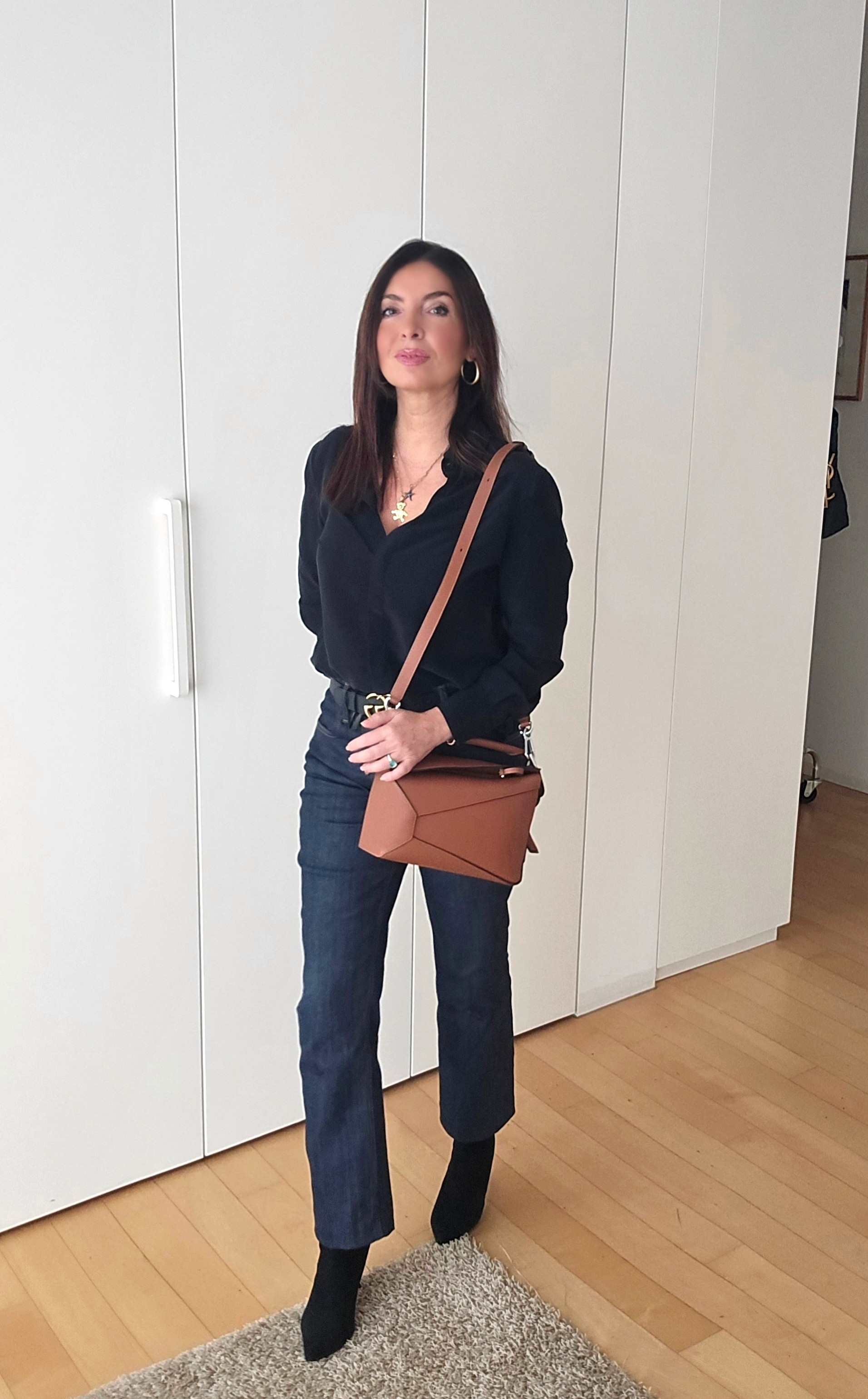 Pair a classic black coat with dark blue jeans for a chic yet casual vibe, and elevate the look with sleek black booties. Finish it off with the iconic YSL Kate bag for that touch of luxury. Perfect for city strolls or a polished everyday outfit. #WinterOutfitGoals #EffortlessChic #LuxuryStyle  

 #LTKeurope #LTKworkwear #LTKover50style