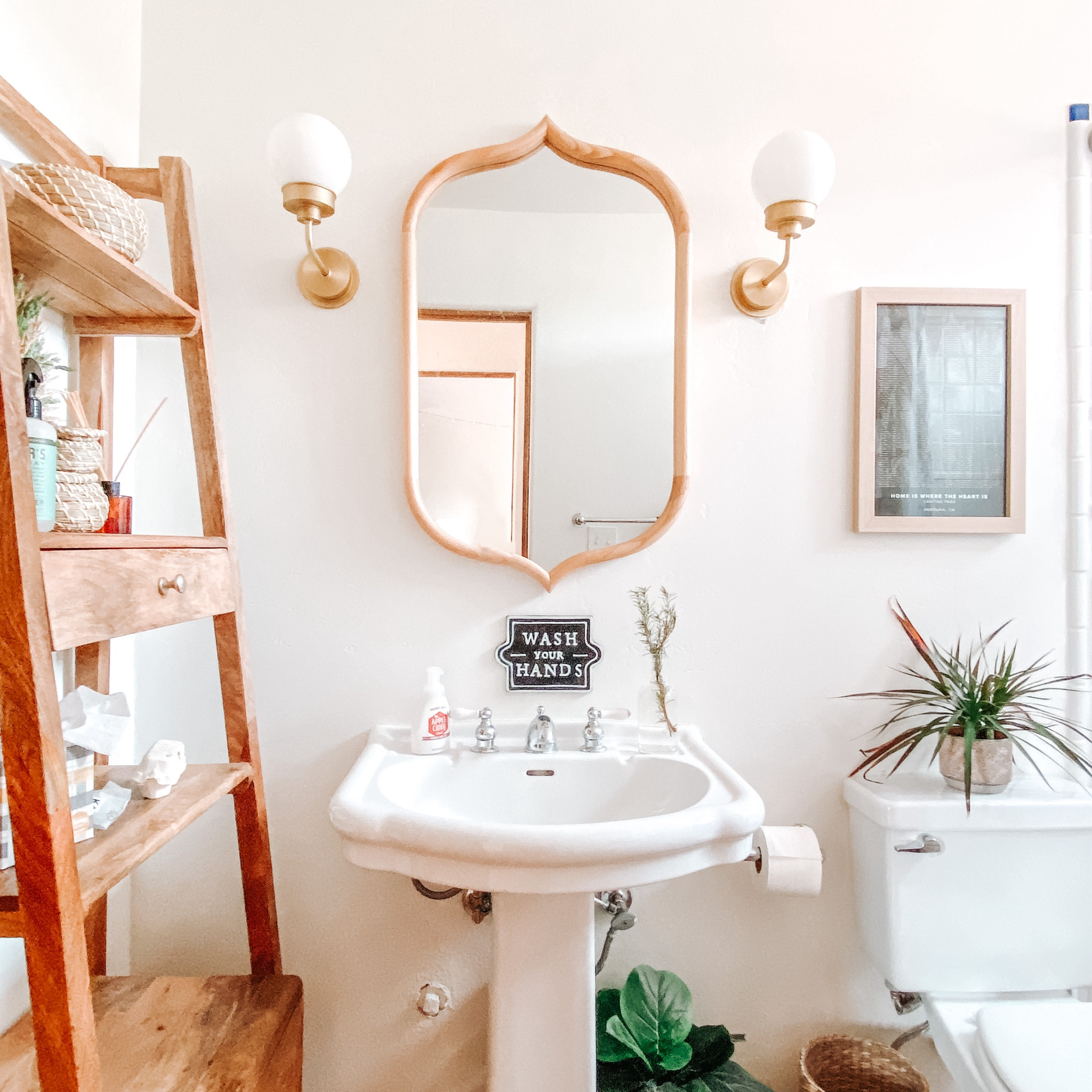 This was a fun little boho bathroom update I did over at our Ojai vacation rental- Stella Vista Ranch. I just swapped out the old mirror with this Moroccan mirror and updated the lighting with these globe mid century brass sconces. A cute Moroccan boho shower curtain and some fun plants and there we go!








Bathroom storage | organization | affordable home decor | bathroom decor 

#LTKFindsUnder50 #LTKHome #LTKStyleTip