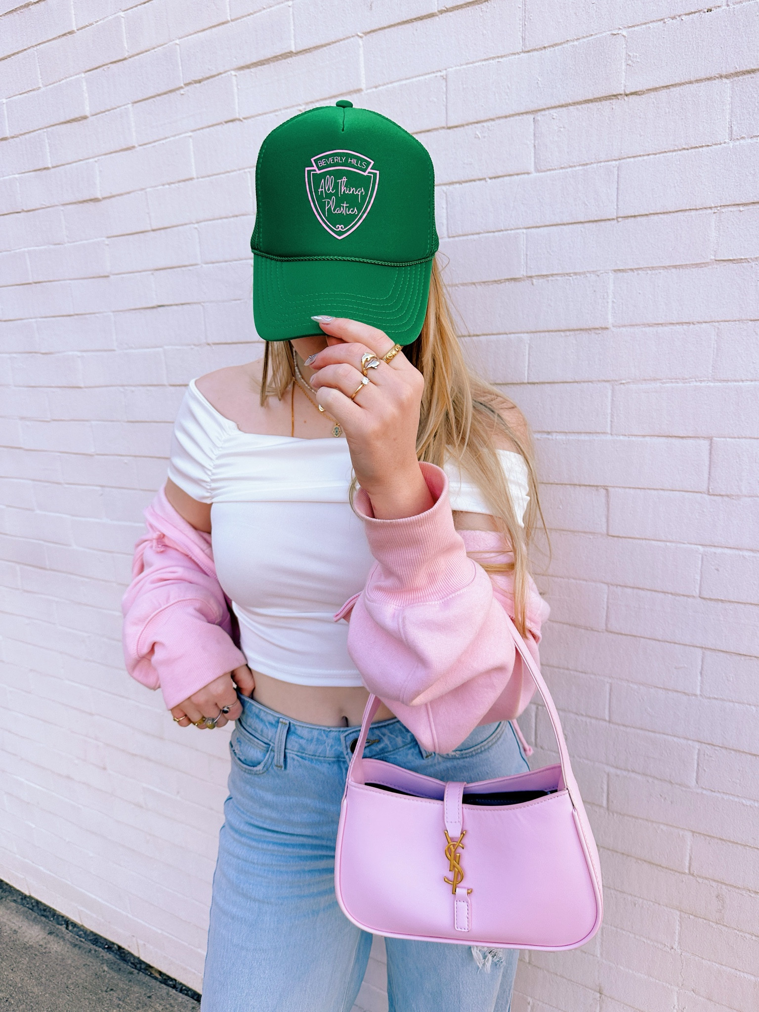 Spring outfit | Spring clothing | Spring style | Crop top | Off the shoulder top | Pink purse | Baggy jeans | Trucker hat | Luxury bag

#LTKSpringSale #LTKSeasonal #LTKstyletip