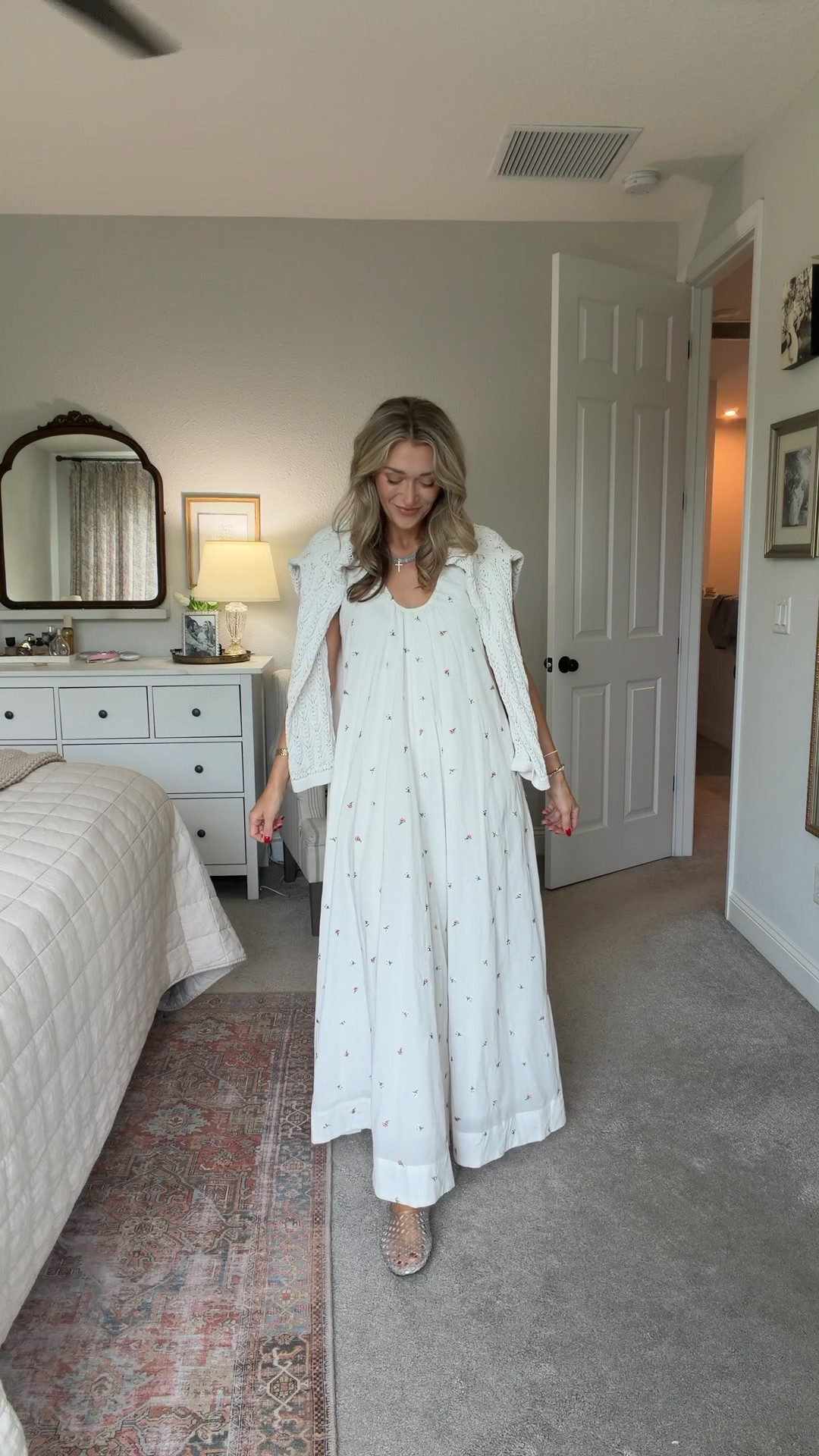 This dress stopped me in my tracks. The delicate floral print, flowy fit, and timeless silhouette make it perfect for church, family photos, bridal showers, or summer celebrations. 

If shopping directly with petal and pup, you can use the code Erin20 for 20% off your purchase or shop at these other local retailers!

Petal + Pup dress, LL Bean tote, jelly flats, church outfit, family photo outfit, white dress, classic style, summer dress
