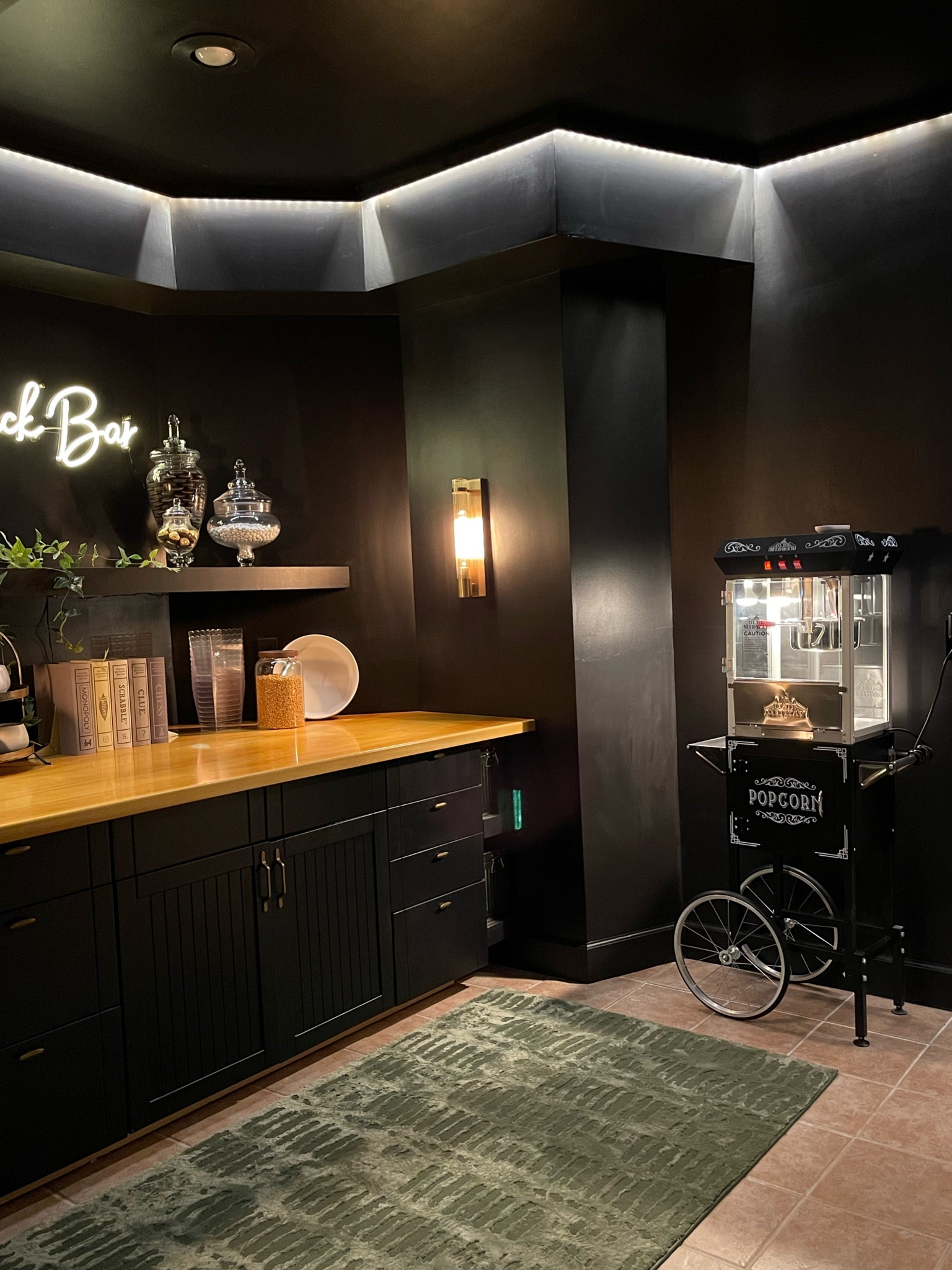 Shades of Light's elegant sconces effortlessly set the ideal ambiance in this charming snack bar cove. The fluted glass design, combined with the modern simplicity of these lights, adds a perfect touch to elevate and enhance the overall space.

#LTKhome #LTKfamily #LTKFind