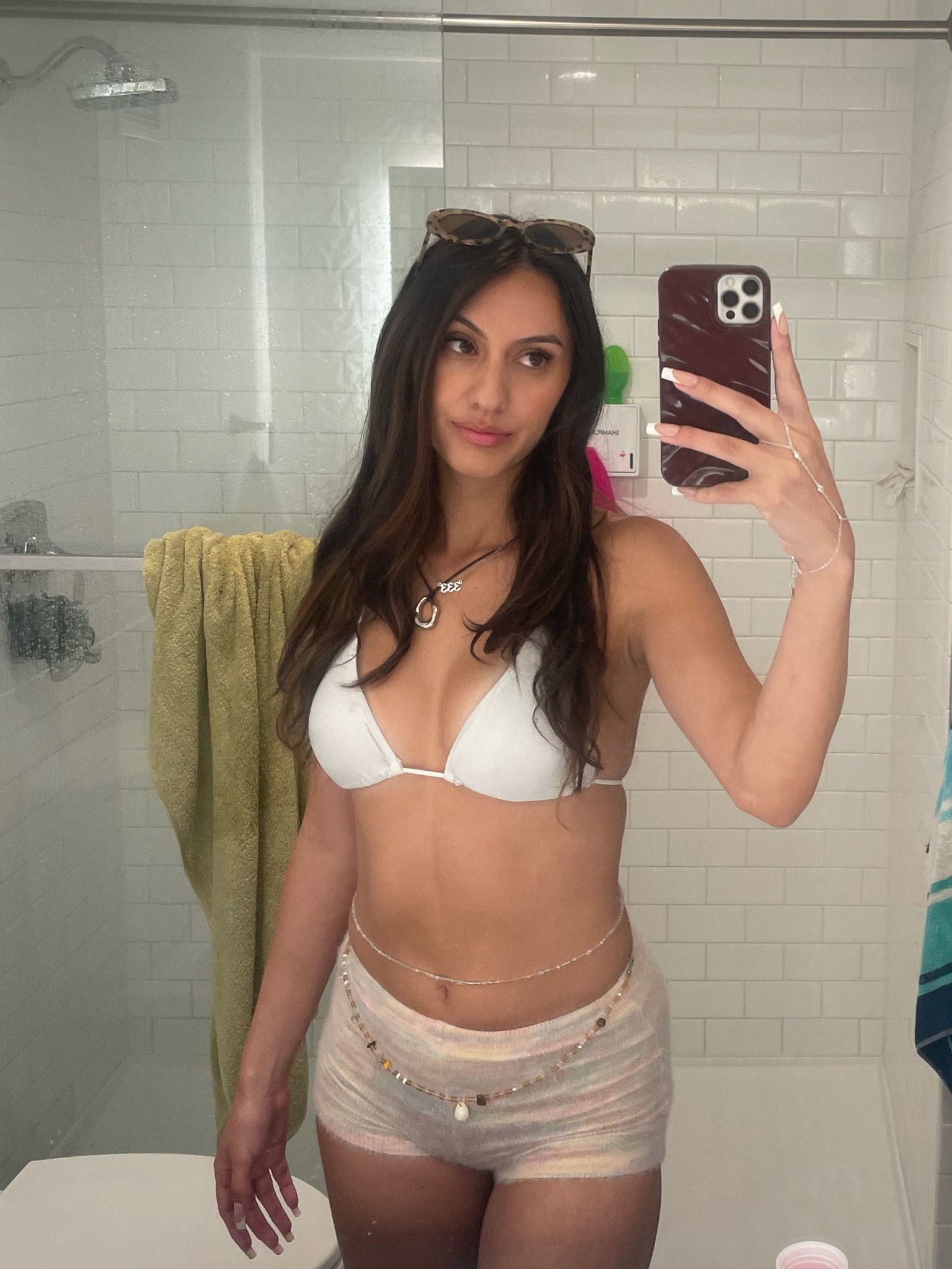 This is by far has been my cutest Las vegas day club outfit. Mini knitted shorts paired with a basic white bikini top and cute waist chains. (Not pictured: my white platform converse) 

Summer outfit inspo for festivals, concerts, pool parties, beach days etc. 

#LTKStyleTip #LTKParties #LTKSwim
