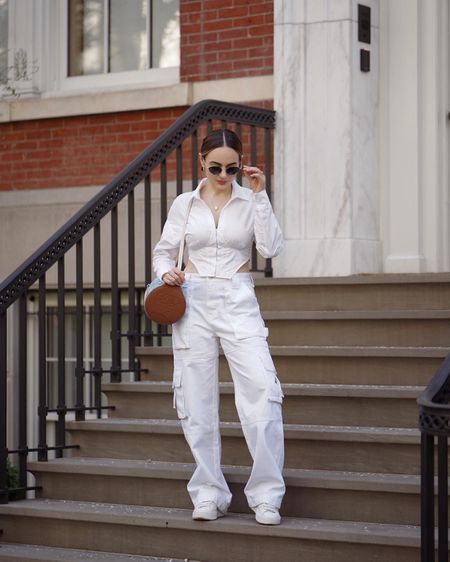 All white summer outfit idea. White corset bottom down and white cargo pants. 

#LTKstyletip #LTKSeasonal #LTKunder100