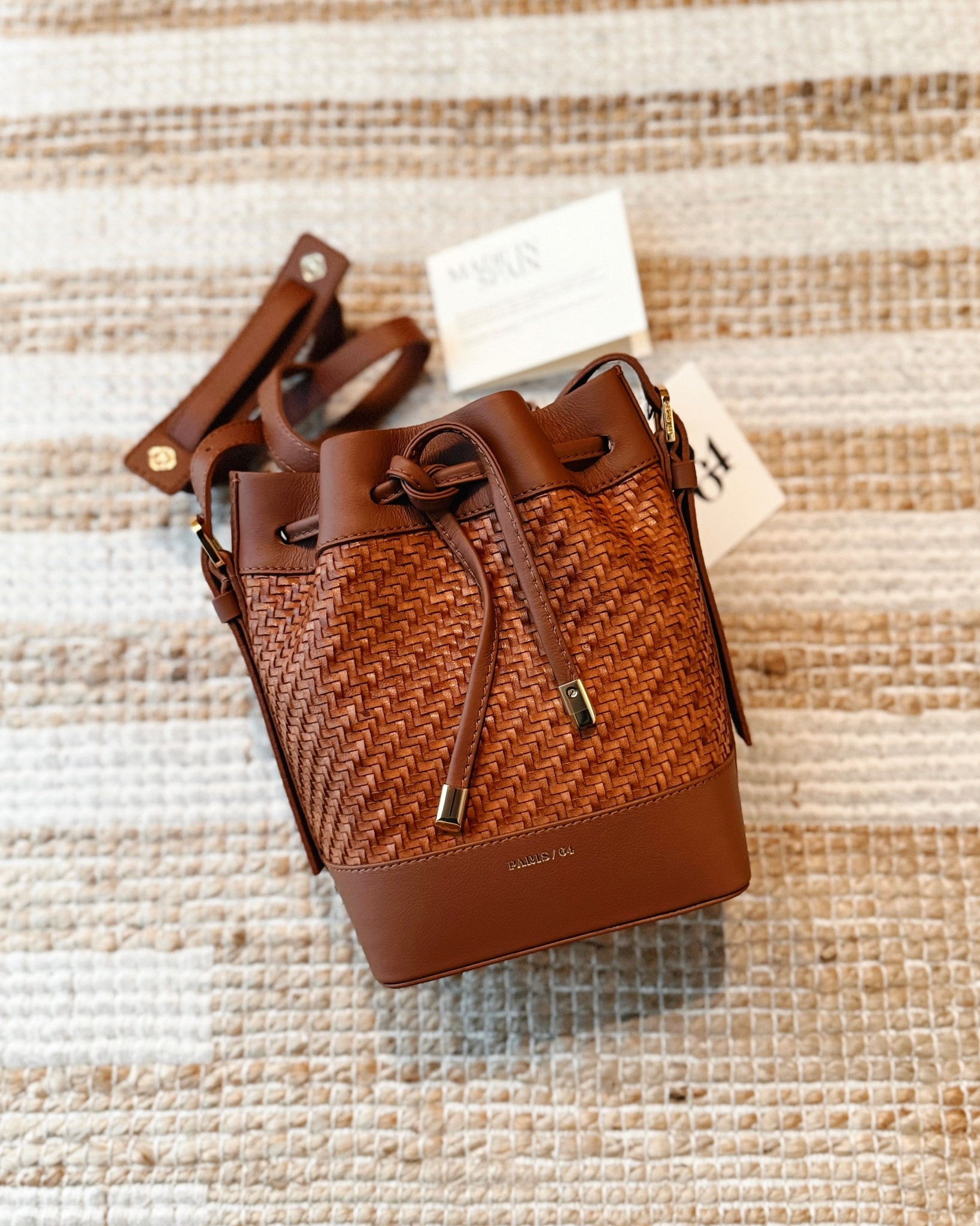 Loving this textured, everyday bucket bag in the perfect size for all my essentials. Available in various colors and fabrications! 🤎

#bucketbag #tanbag #wovenleather #summerbag

#LTKItBag #LTKStyleTip #LTKSeasonal