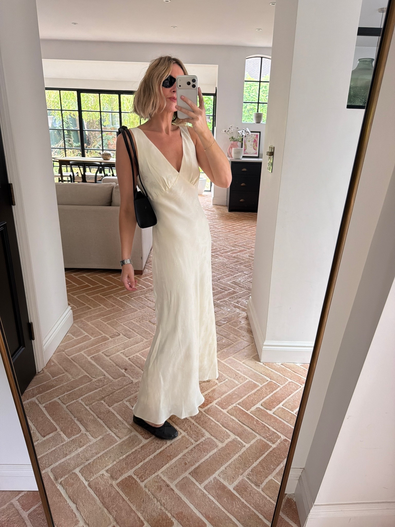 ivory satin slip dress, v neck maxi dress, bias cut satin gown, black ballet flats, black mini shoulder bag, black sunglasses, silver watch, wedding guest dress, occasion dress, summer evening outfit, quiet luxury, elevated basics, effortless chic, ltkstyletip, ltkseasonal, ltkwedding, ltkfindsunder100, outfit inspo, capsule wardrobe essentials

#LTKeurope #LTKdatenight #LTKautumn