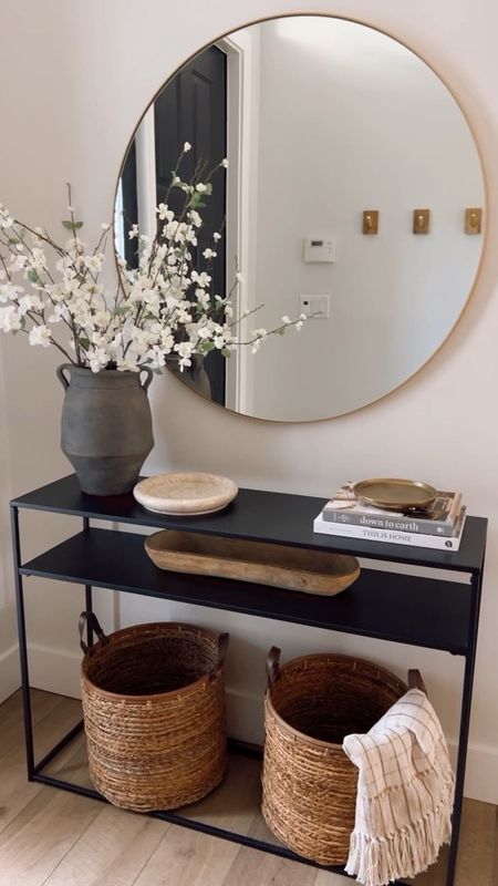 Simple Entryway Console Table Styling 

Home decor, black console table, round brass mirror, entryway styling, vase, faux florals, spring florals

#LTKSeasonal #LTKstyletip #LTKhome