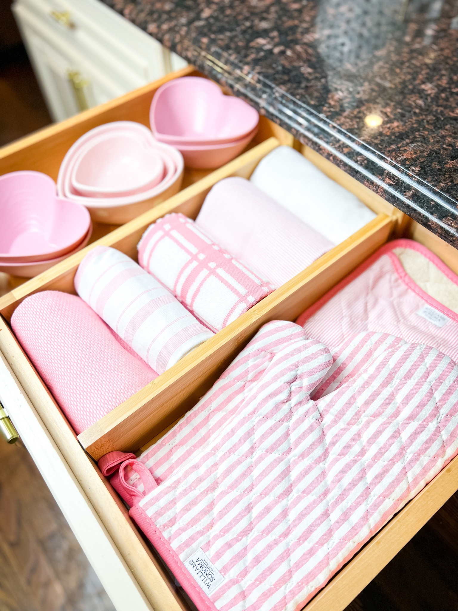 Kitchen Organization and Updates! I updated my kitchen towels, oven mitts, and pot holders for Valentine’s Day! Shop the pic below and follow @MakeItWithMicah for more 💗 

#homedecor #kitchenorganization #drawerorganization 

#LTKhome