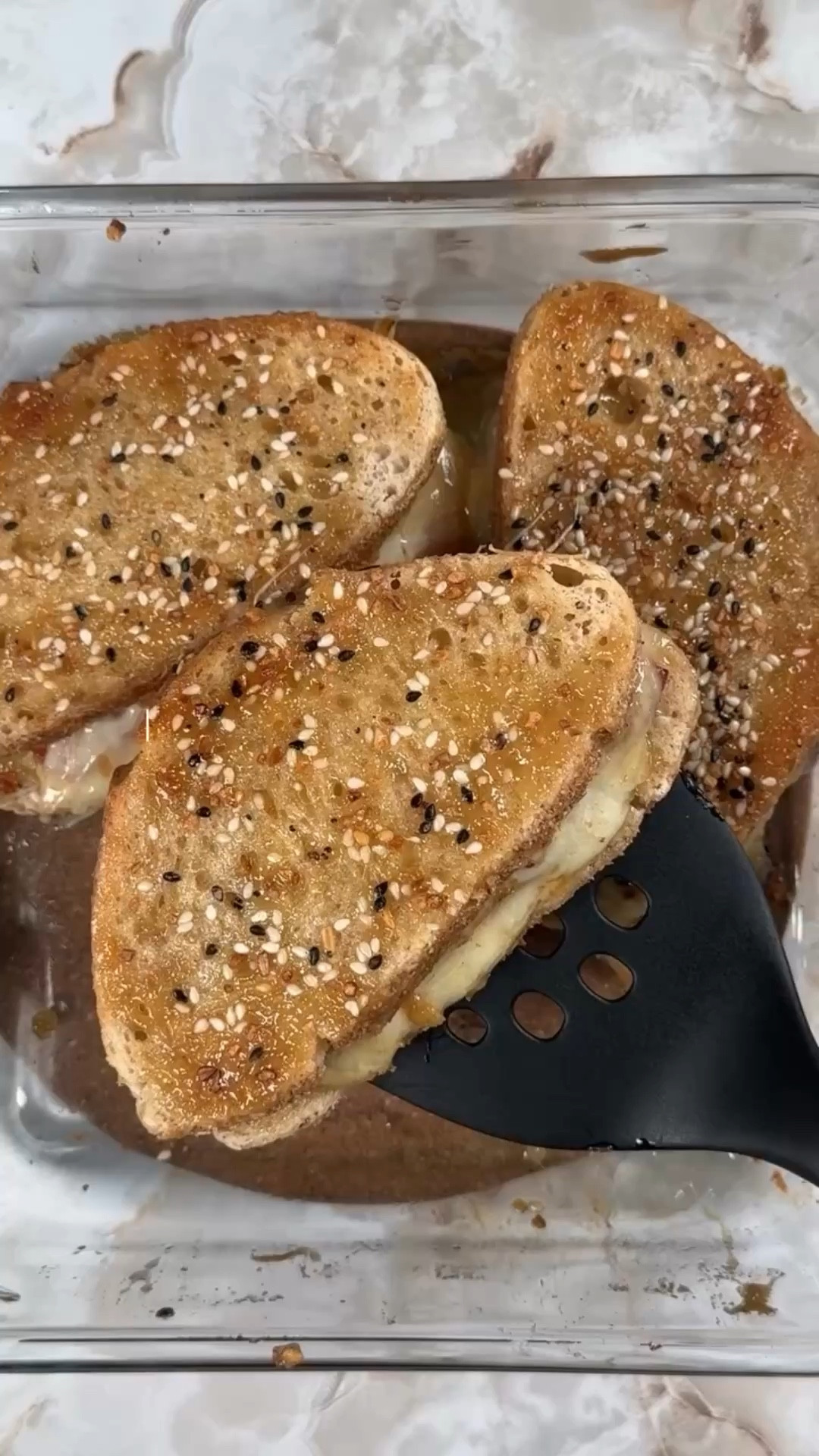 These maple dijon ham & cheese sandwiches are the kind you’ll crave long after Easter! Save this recipe for your holiday ham leftovers. 🍖🧀🐣

Ingredients
8 slices of @stonehousebread sourdough
8 slices ham
8 thin slices Swiss cheese (2 per sandwich)
1/2 cup mayo (I like @dukes_mayonnaise )
3 tablespoons dijon mustard
3 tablespoons maple syrup
Everything bagel seasoning 
Preheat oven to 350°F

In a small bowl mix mayo, dijon, and maple syrup until smooth.

Spread the maple dijon mayo on the inside of each slice of bread.

Layer ham and 2 slices of Swiss cheese per sandwich.

Spread a layer of the maple dijon mayo on the outside of the bread and sprinkle with everything bagel seasoning.

Cover with foil and bake for 15 minutes, remove the foil and bake for 10 additional minutes, and broil until the top of the sandwiches get crispy about 4-5 minutes. Enjoy! 

#stonehousebread #michiganbakery #traversecitymichigan

#LTKHome #LTKfoodie #LTKSeasonal