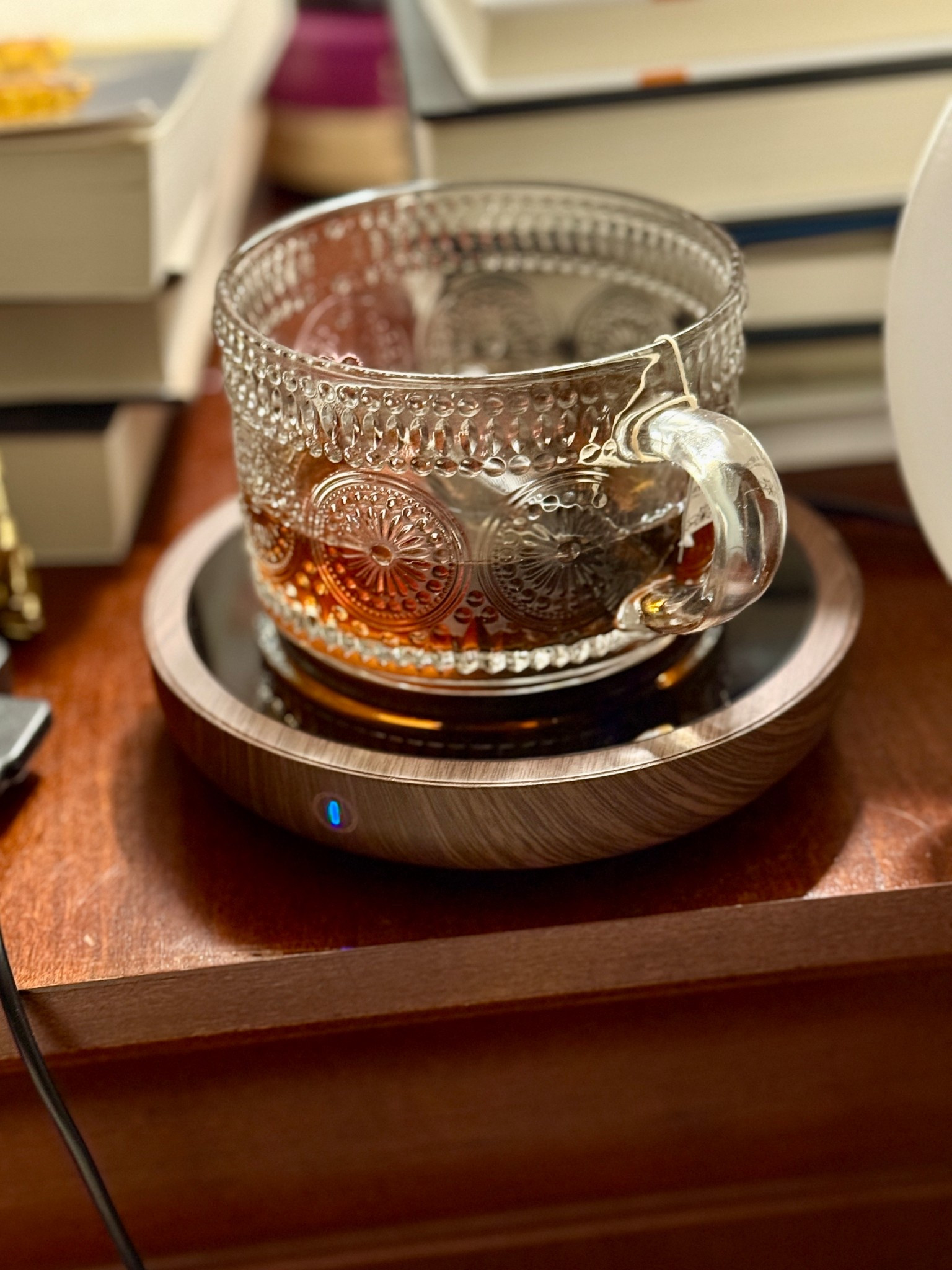 I’ve become obsessed with decaf tea before bed, but I hate that it gets cold before I finish it. Bought this mug warmer for my nightstand and the most precious little vintage coffee mug set with gold spoons. And this tea is delish and perfect to help me wind down after a long day. Would make a wonderful gift  

#LTKOver40 #LTKHome #LTKselfcare