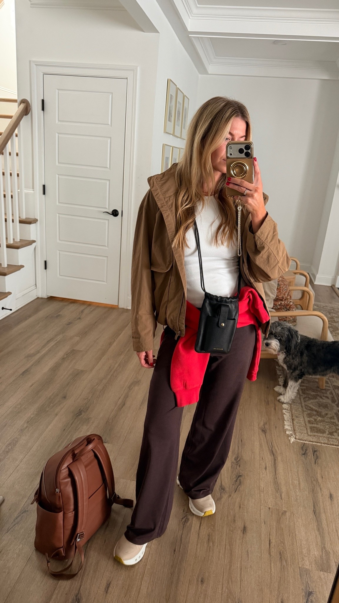 Airport outfit for our overnight flight. 

White tank with built in bra: TTS, wearing S
Waterproof ON Cloud tan running shoes: TTS
Brown soft Vuori travel pants: TTS, wearing W
Brown windbreaker: TTS, wearing S

#LTKgrwm #LTKTravel #LTKdayinmylife