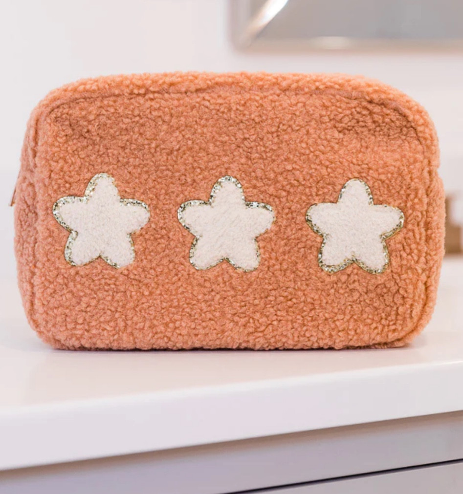 new teddy sherpa makeup bags at pink lily

#LTKitbag #LTKtravel #LTKbeauty