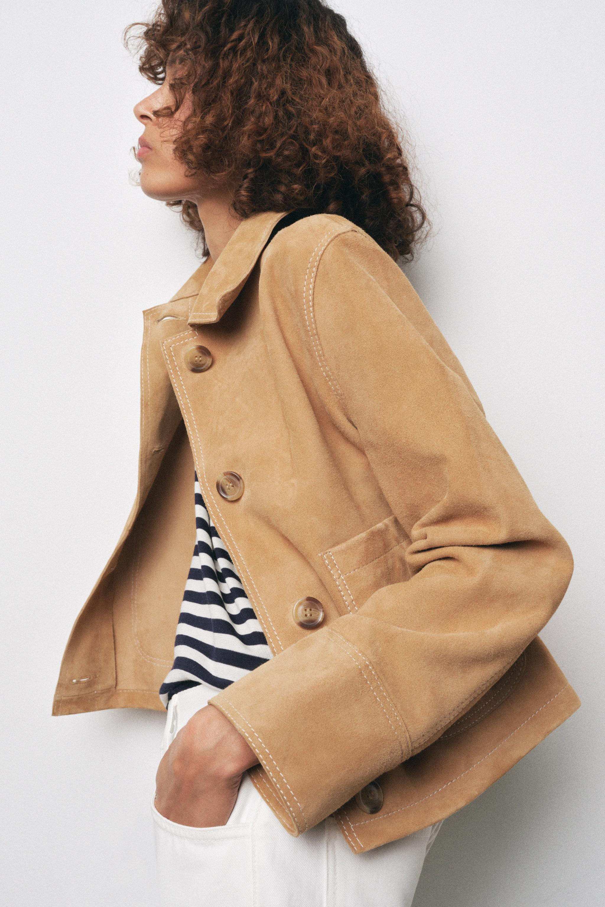 ZARA WOMAN COLLECTIONJacket made of 100% suede leather. Lapel collar and long sleeves. Front patc... | Zara US