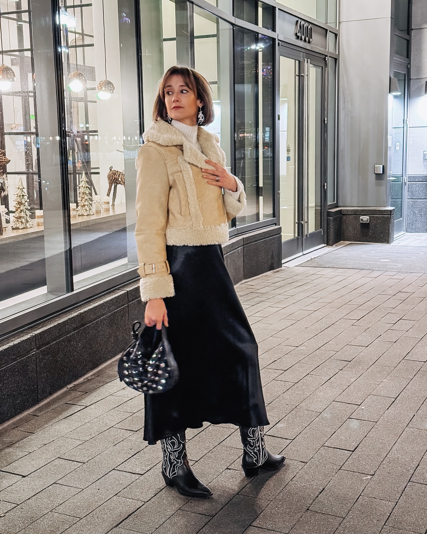 Bundled chic for an impromptu holiday dinner date. I love this shearling jacket with a turtleneck sweater, silk skirt & cowboy boots tor a laid back look.

#LTKSeasonal #LTKShoeCrush #LTKHoliday