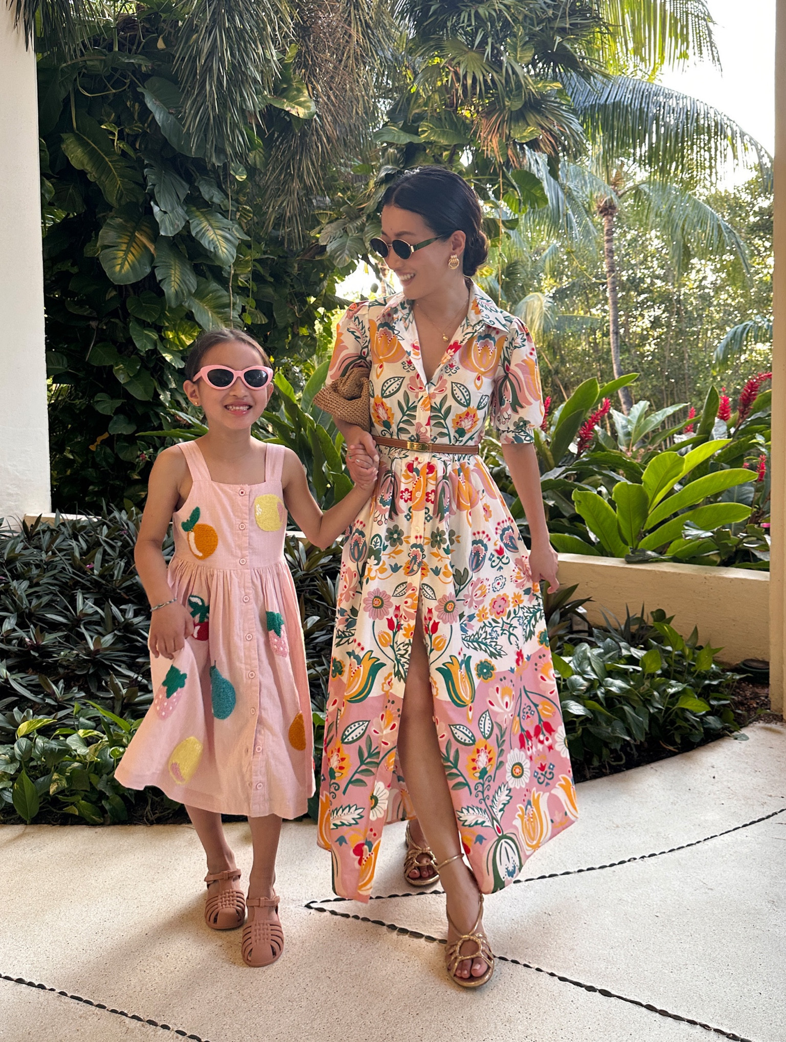 Colorful and unique 100% cotton dresses for vacation! Each Boden item page has a discount code.

On me:
• Boden Alexa maxi shirt dress 0P - I’m usually a 00p in other brands so this has some room on me at the torso and waist. Feels fairly TTS for that size - 15” across bust, 14” across waist before being tied, 49” length 

Quality 100% cotton is lightweight and comfortable, and breathable on a warm day. 

Buttons all the way to the hem, so it can be nursing friendly and you can choose to show a little leg. 

Removable sash tie belt (not pictured but you can see it in a separate LTK)

• Hermes Kelly belt one size 

• Sezane Gloria flat gold sandals 36, I am a half size so i went to the bigger whole size 

• J. Crew woven clutch bag 

• Amazon sunnies

On Nori:
• Mini Boden button through woven dress - Swingy breezy cut, pockets, 100% cotton. Lined.

Adorable boucle fruit appliqués. Looser fit. Nori is age 6 and the size 6-7 in this one has a roomy swingy fit that she has room to grow into.

• girls Amazon Jelly sandals are true to size and easy to put on with Velcro straps! 

Kids vacation , resort outfits, spring break, mom and me matching outfits, mother daughter, summer dresses, mommy and me style 

#LTKFamily #LTKKids #LTKPetite
