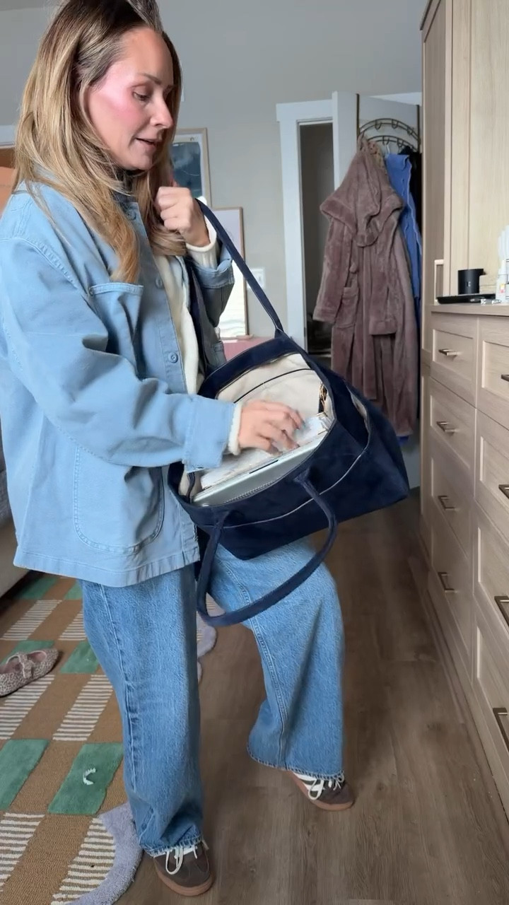 The winter work bag I actually use 🤎 Structured enough to look polished, soft suede that feels elevated, and big enough for real life — laptop, planner, snacks, everything.  This is the Quince Italian suede shopper tote and it gives quiet luxury without the designer price tag. It instantly makes winter outfits feel more put together, whether I’m heading to meetings, school pickup, or coffee runs.  If you’ve been looking for a chic, functional winter work tote, this is it.

#LTKstorytime #LTKgrwm #LTKootd