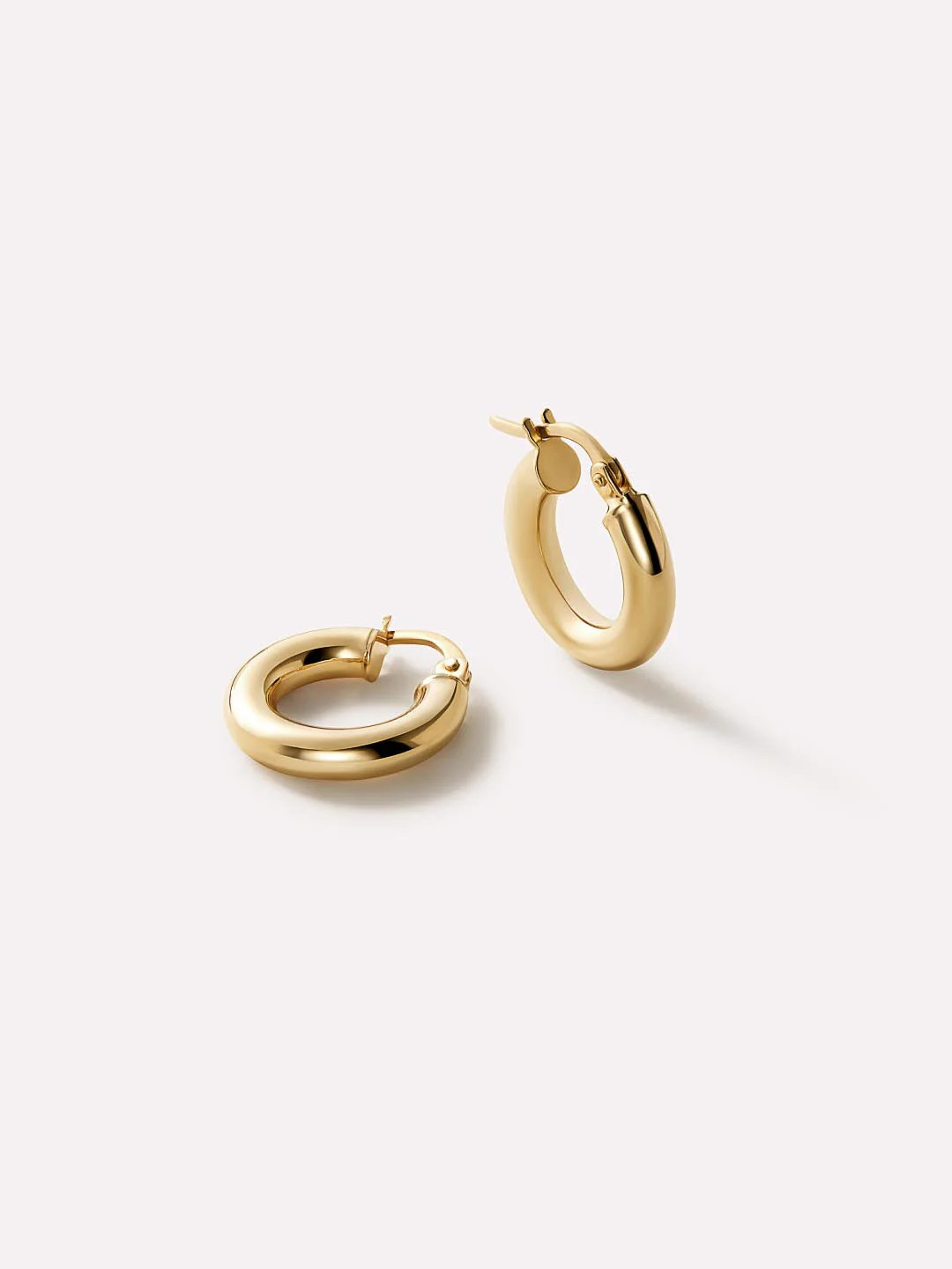 Your search for the perfect go-to hoops is over with these chunky gold hoop earrings crafted in 1... | Ana Luisa