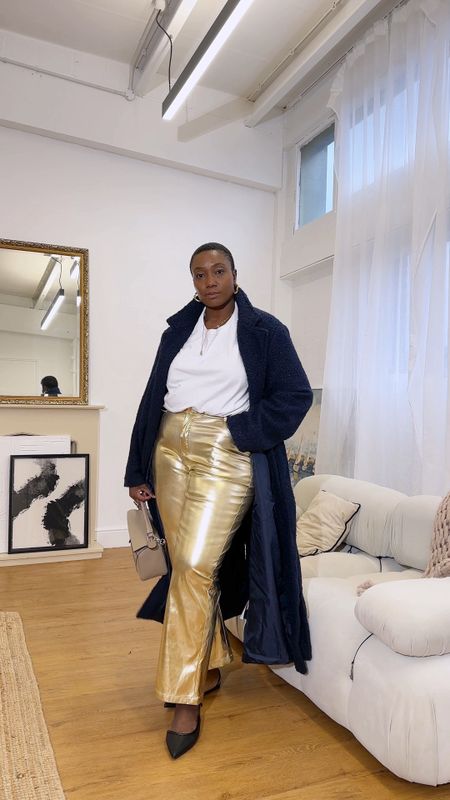 Navy and gold is just a vibe ✨

Styling a pair of gold metallic trousers for a cosy night out. With a navy coat and pointed flat heels. Let me know what you think of this outfit. 

Trousers are quiz clothing similar linked below. 

Wear or tear ? 

Complete outfit or similar will be linked on my @ltk.europe in my bio x 

#midsizefashion #curvystyles #metallicoutfit #trouserstyles #maxicoat #navycoat 
Navy coat, maxi coat, gold trousers, curvy style, size16 style

#LTKVideo #LTKmidsize #LTKstyletip