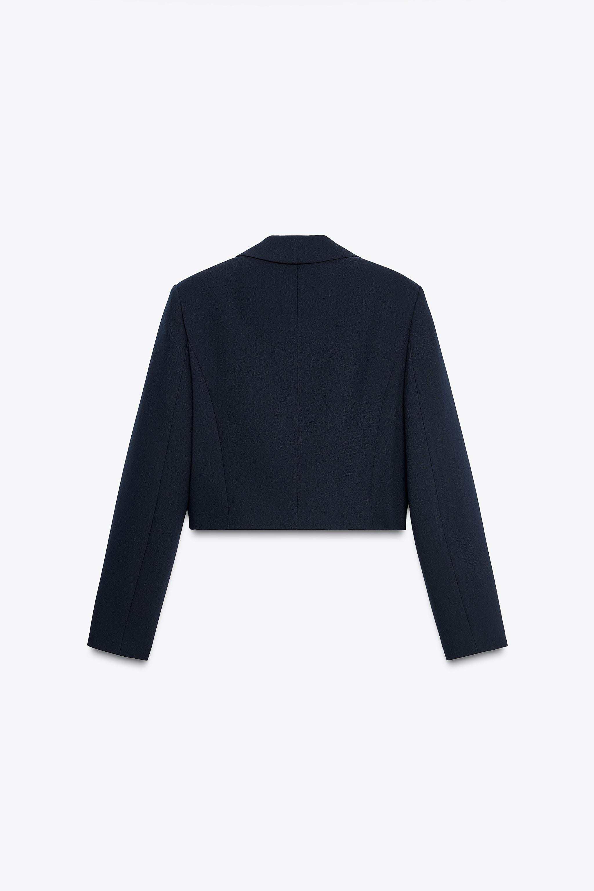 Cropped blazer with lapel collar and long sleeves with shoulder pads. Front flap patch pockets. S... | Zara US
