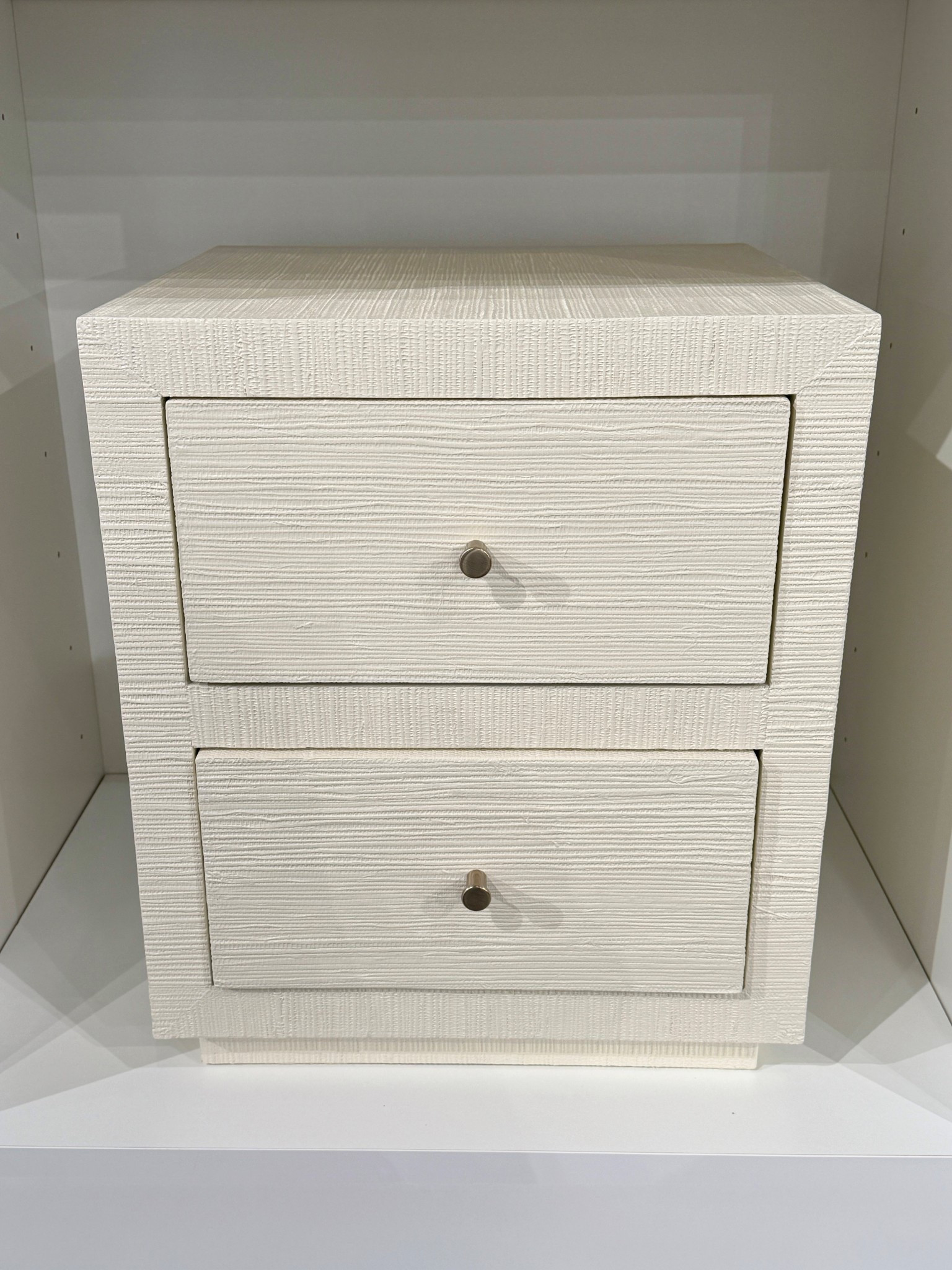 Modern coastal bedside find! ✨ The Mayson Painted Grasscloth Nightstand from West Elm has such a clean, minimal look with its textured grasscloth finish. 🤍 The two roomy drawers make it perfect for keeping bedside essentials tucked away—especially great for small space storage. 🫶🏻 #WestElm #nightstand #bedsidetable

#LTKHome #LTKSaleAlert