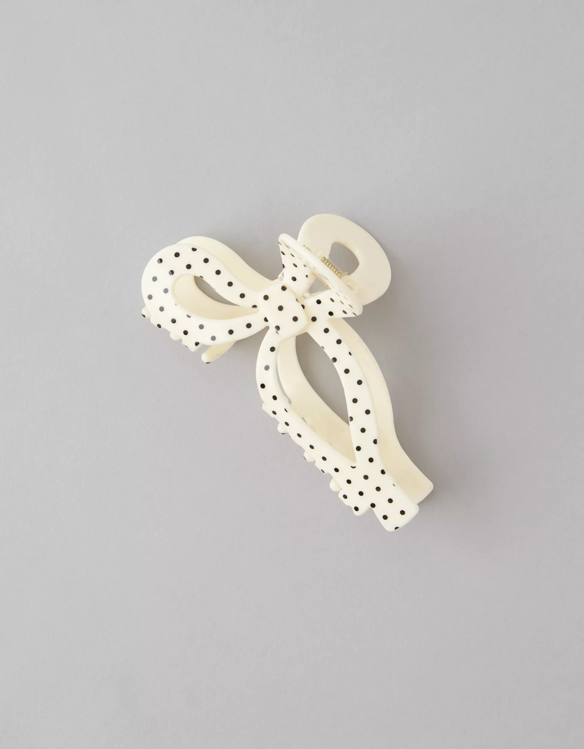 Statement-making bow-shaped polka dot claw clip for everyday styling. | American Eagle Outfitters (US & CA)