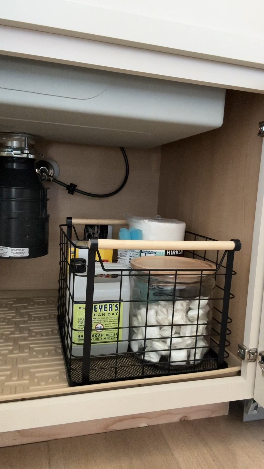 Under the sink organization- kitchen edition with some Target finds! I wanted a different look than clear acrylic so I went with black wire baskets. The Cascade dishwasher pods in the glass canister are my favorite- they contain no dyes! 

#LTKunder50 #LTKhome