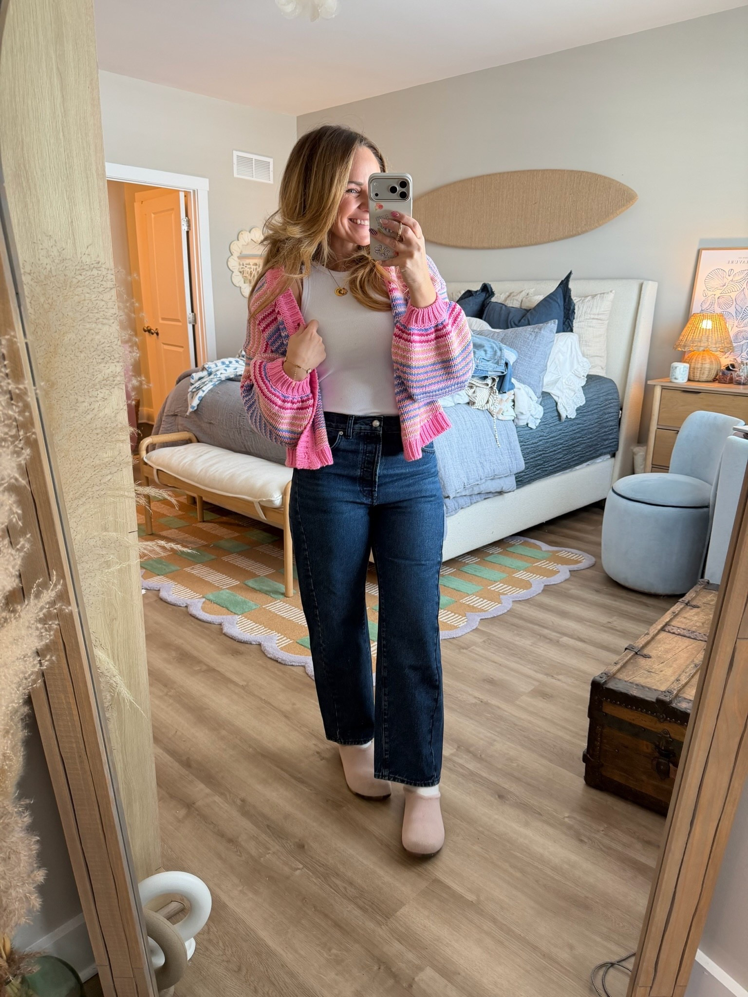 You need some serotonin in your life… and apparently mine comes in cardigan form 💗🌈

The colors. The chunky knit. The way it instantly makes a basic tee + denim feel intentional. This is the kind of layer you’ll reach for on repeat when winter is dragging but you’re mentally in spring.

It’s soft, slightly cropped, and the happiest thing in my closet right now.