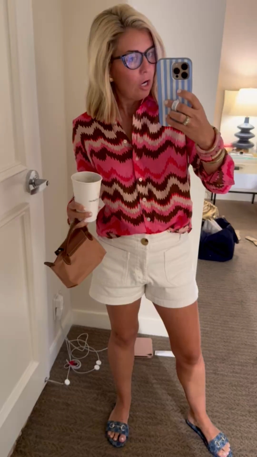 Off to breakfast in this statement button down. When I saw this print, I knew I had to have it in everything in comes in!! Literally have the top, the dress, the Kafton and the swimsuit. I’m in a 2 top, 27 short (size 1 up) and 38.5 sandal (1/2 size up). ￼
*Use code mixandmatchmadness at Loopy
*Use code Catherine20 at Allie + Bess

#LTKTravel #LTKdayinmylife #LTKootd