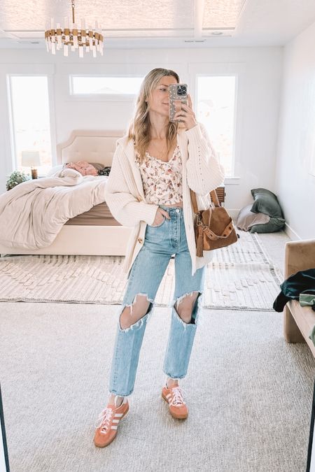 You all know and love these Agolde jeans by now - splurge but I wear them multiple times a week (I went 2 sizes down) - this cardigan is perfection and goes with everything (comes in lots of colors) - Free People top from Nordstrom I’ve worn many times already and comes in green too - and my suede crossbody purse also comes in lots of colors - pink adidas gazelle I love so much!

#LTKfindsunder100 #LTKshoecrush #LTKSeasonal