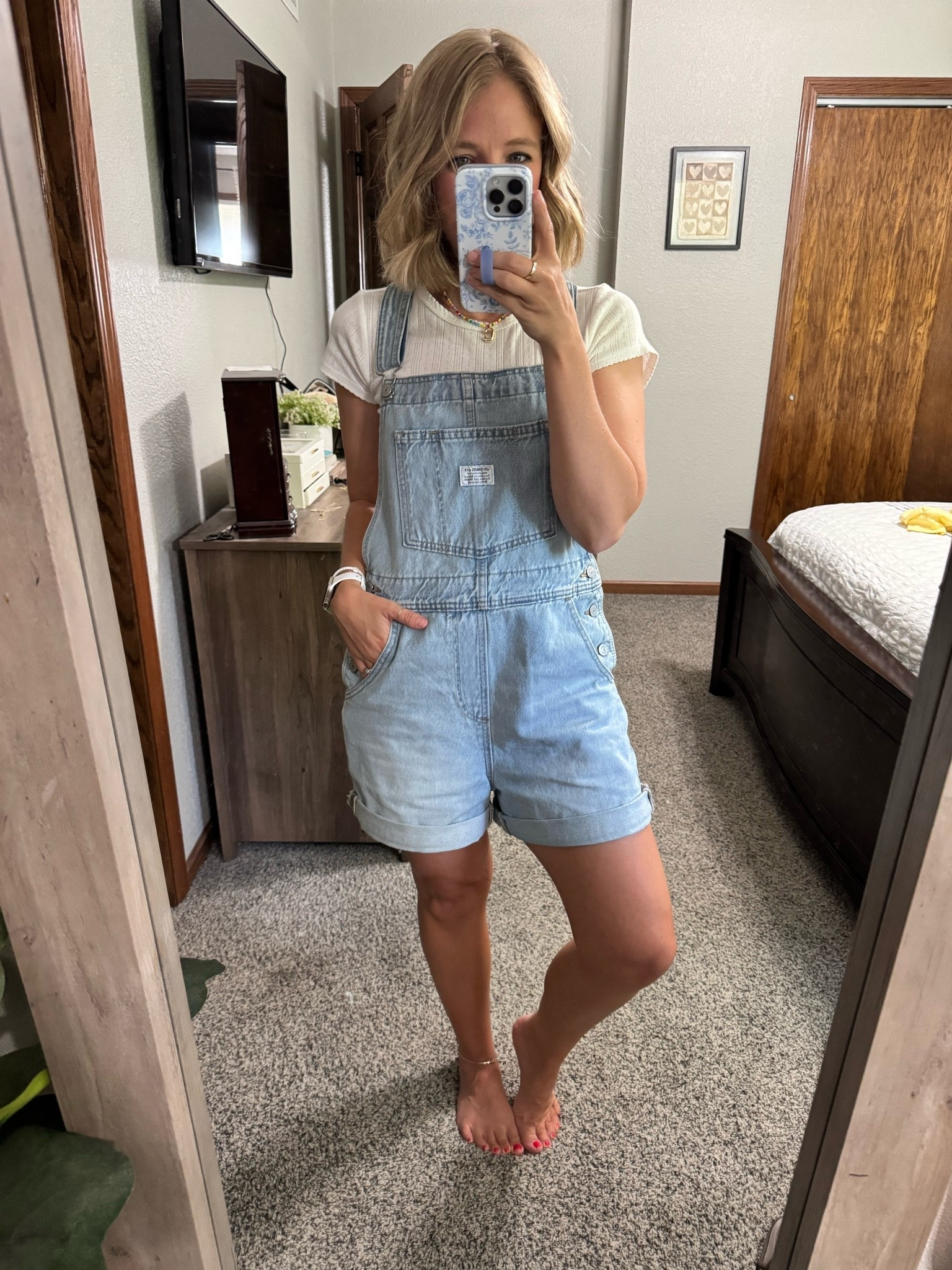 Wearing a size small in the overalls, but I could have probably done an xs as well. My top is a size small.