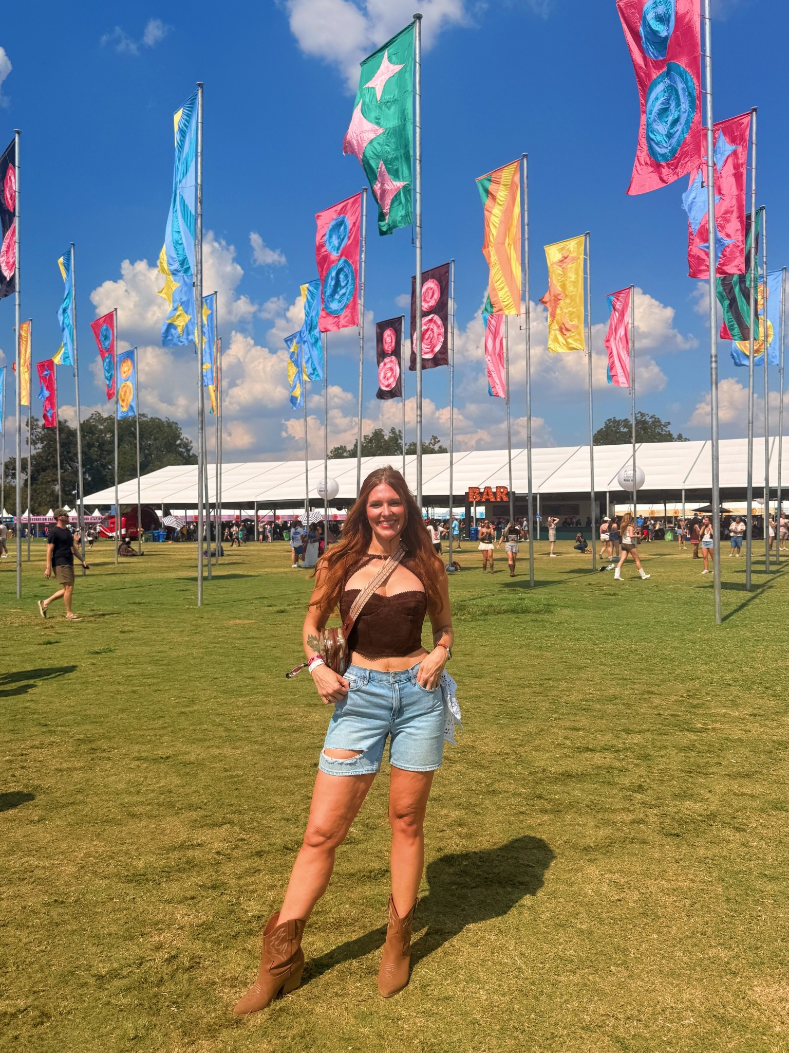 ACL fit, concert outfit, country concert, denim shorts, corset, boots, crossbody bag, western, boho western