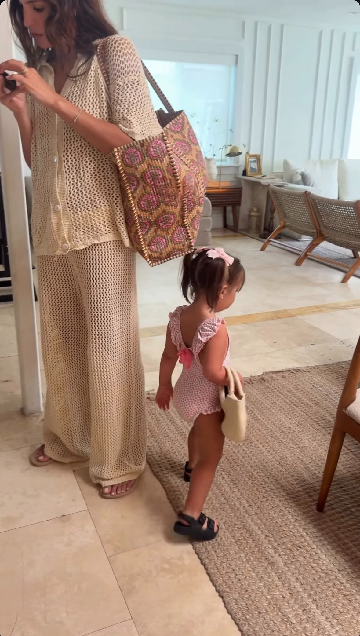 Pool day prep with my favorite little companion 🥥🌸 

 #LTKootd #LTKmomlife #LTKSwim