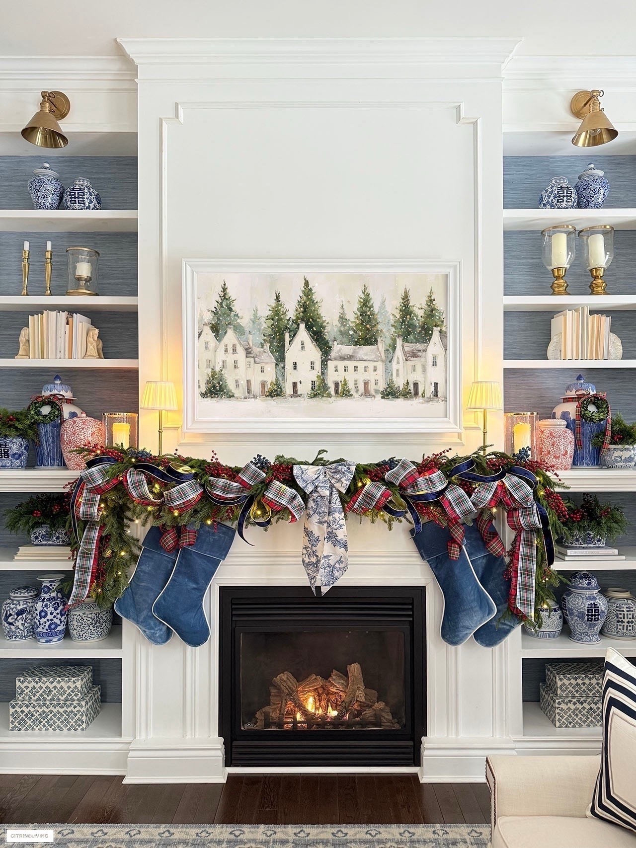 Our classic Christmas mantel! Gorgeous velvet stockings, mixed lush greenery, mixed plaid ribbon, velvet ribbon, red berry picks finished with a beautiful toile bow is layered and chic for a festive holiday look!

#LTKHoliday #LTKSeasonal #LTKHome