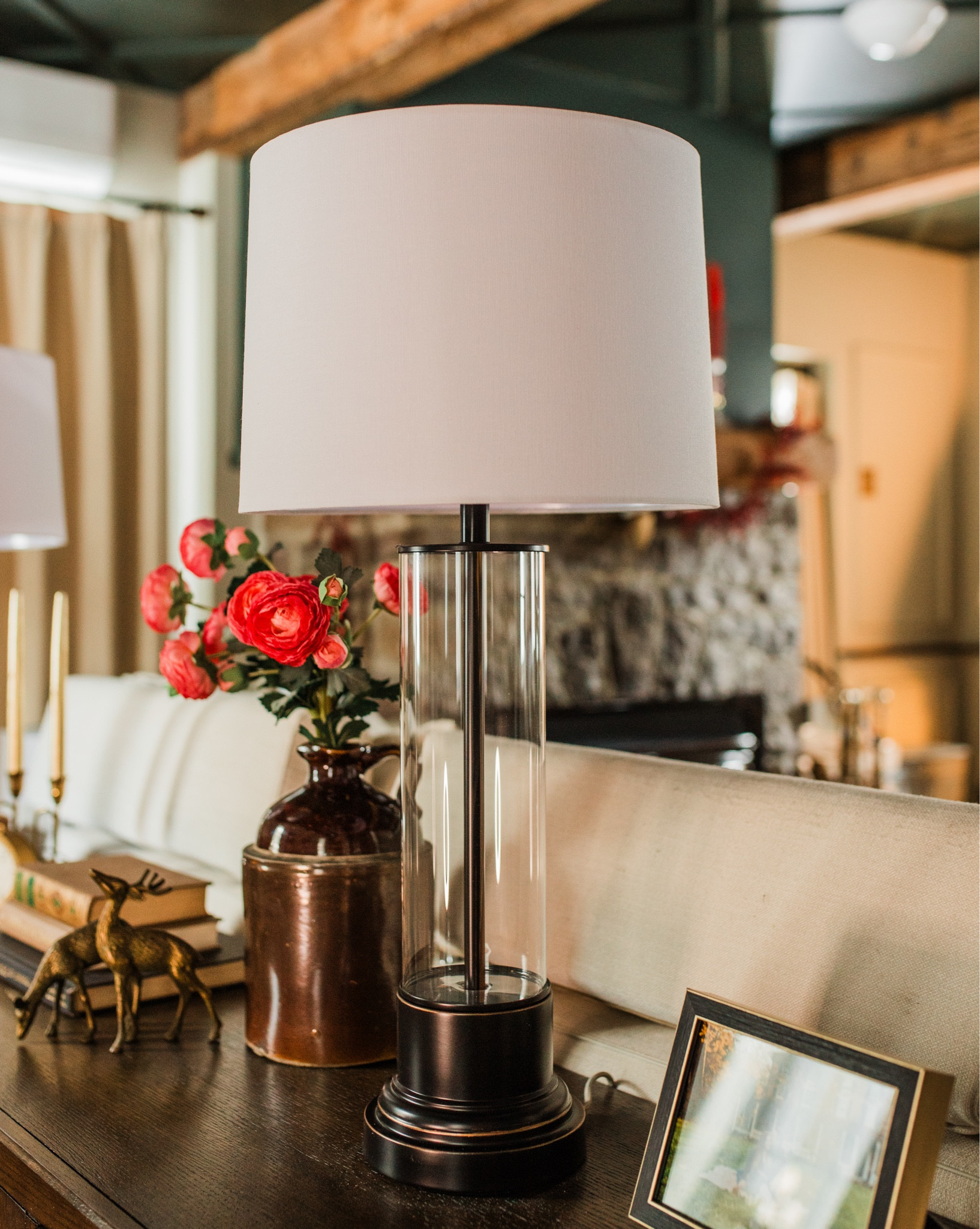 The lighting we use throughout this room. A mix of pendants, table lamps, and a floor lamp makes the space feel layered and comfortable at any time of day. #lamps #lighting

#LTKHome #LTKU