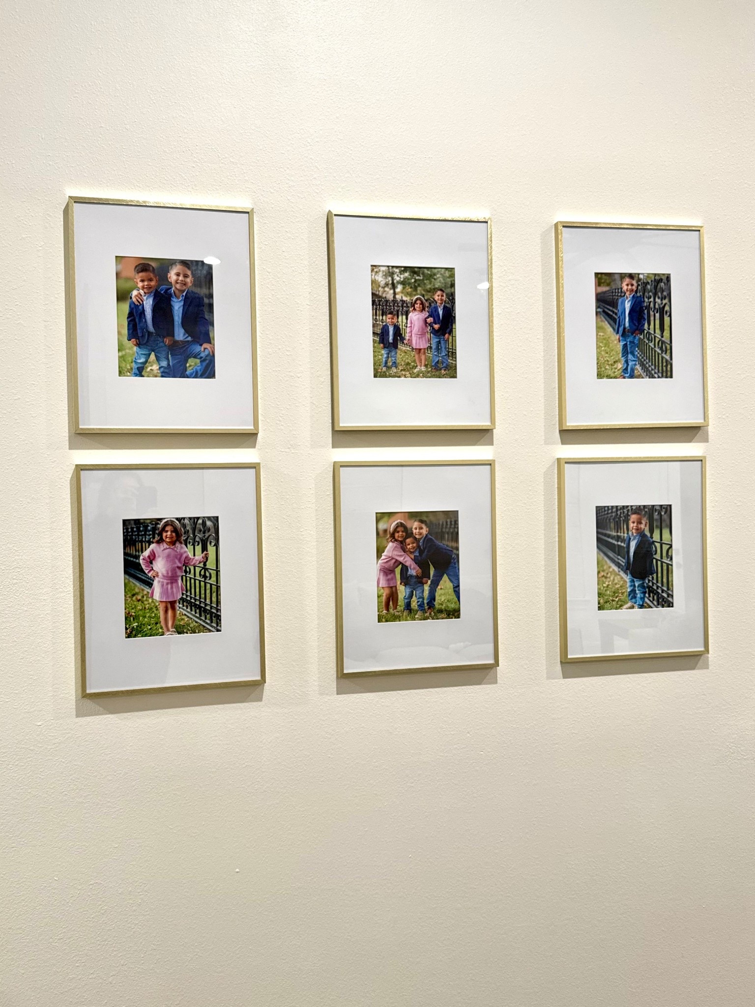Gallery wall. Family pictures. Gold picture frames are for 8x10 pictures. Frames are Threshold from Target. Printed pictures from Shutterfly. 

#LTKHome #LTKFindsUnder100 #LTKFindsUnder50