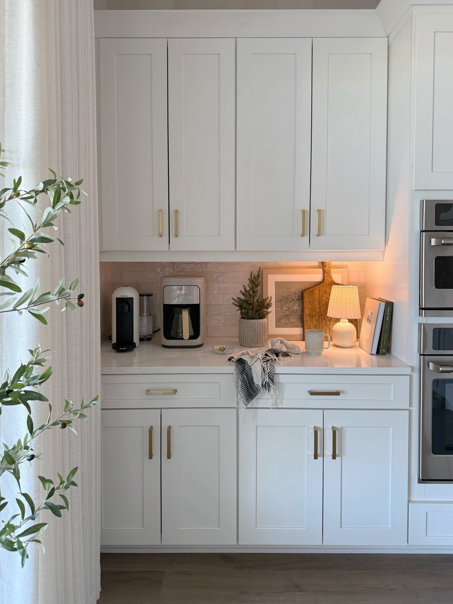 Coffee bar, kitchen styling, kitchen decor, mini lamp, coffee maker, Nespresso machine, coffee cup, winter styling, artwork, cookbooks, kitchen Inspo, home decor, neutral home 

#LTKHome #LTKSeasonal