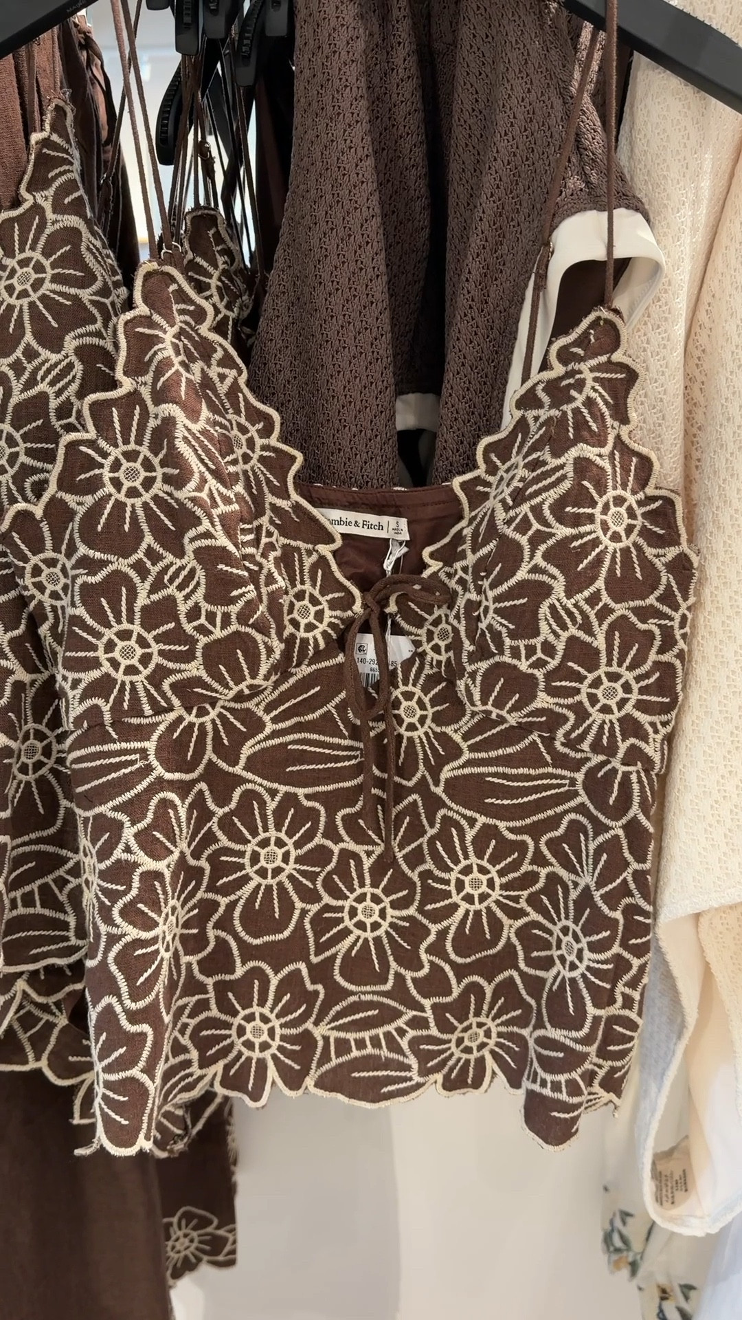 New at Abercrombie & Fitch and currently on sale! 🤎  The Embroidered A&F Bella Bra-Free Tie-Front Cami is such a cute summer piece. Made from a soft linen-blend fabric, it features embroidered cutwork details, a flattering V-neckline, and adjustable tie-front and straps for the perfect fit. 🙌🏻 It also has a built-in bra with removable pads, so you can comfortably go bra-free. Even better—it comes in three colors and has coordinating bottoms for a full matching set. Linked it here! ✨ #Abercrombie #SummerTop #TankTop

#LTKFestival #LTKSaleAlert #LTKootd