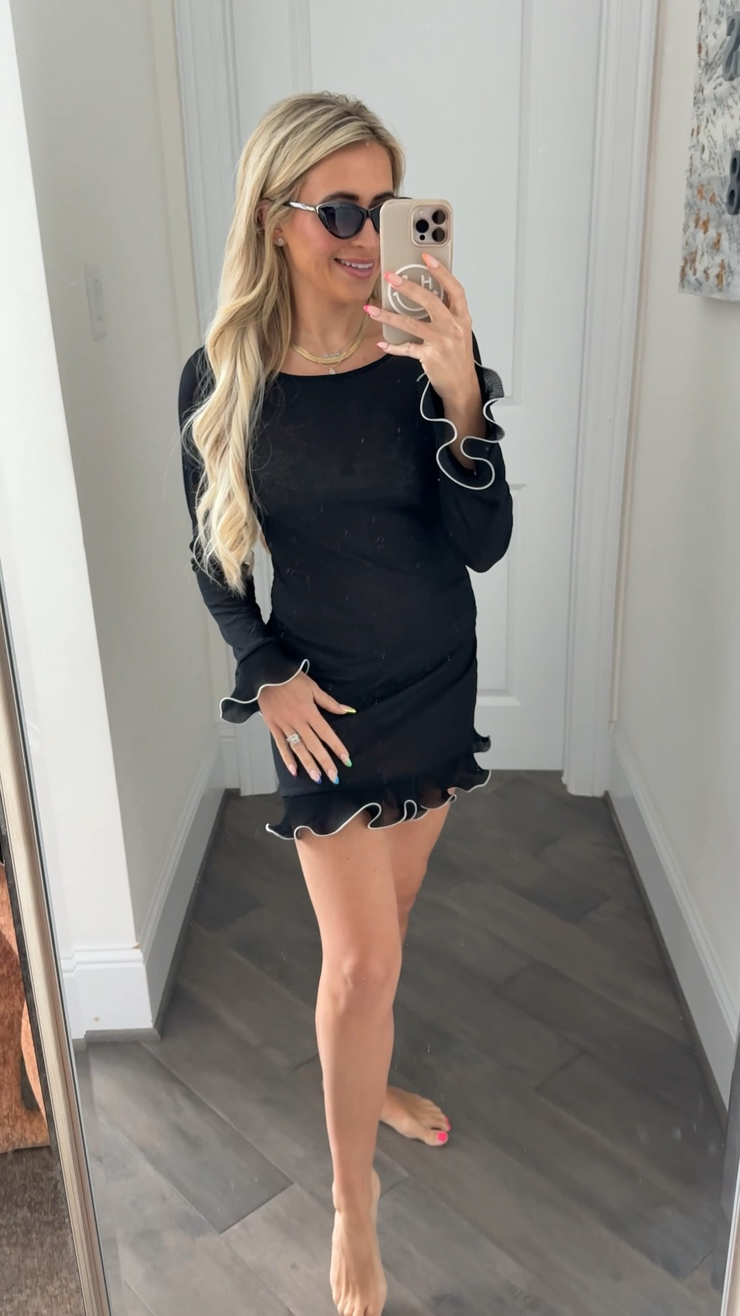 Simple sheer black beach coverup with a little flare thanks to the ruffles on the sleeves and skirt. Also very affordable and less than $10. Linking my black sunglasses too. 

Sizing 👉🏻 SMALL

 I’m 5’4 | 120 lbs | 32C | 25” Waist | Typically a Small 

Vacation outfit, beach outfit, resort look, affordable fashion, swimsuit 


#LTKFindsUnder50 #LTKTravel #LTKSwim