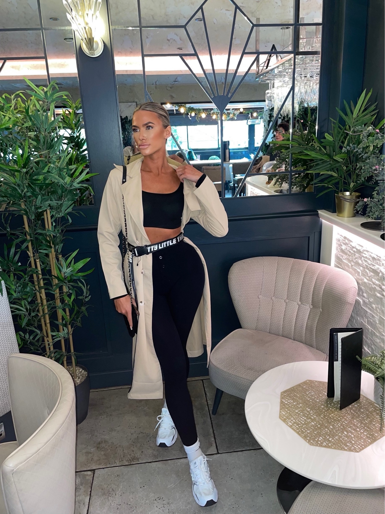 A/W day wear. Trench coat, leggings set/gym set and comfy trainers with sport socks. The belt is not in stock anymore it’s from PLT so I found one similar without the letters. 
Also not my exact NB trainers I found a close match. My bag is DKNY I found a similar style by Valentino.

#LTKU #LTKtravel #LTKSeasonal