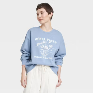 Women's Leisure Studio Oversized Graphic Sweatshirt - Universal Thread™ Blue | Target