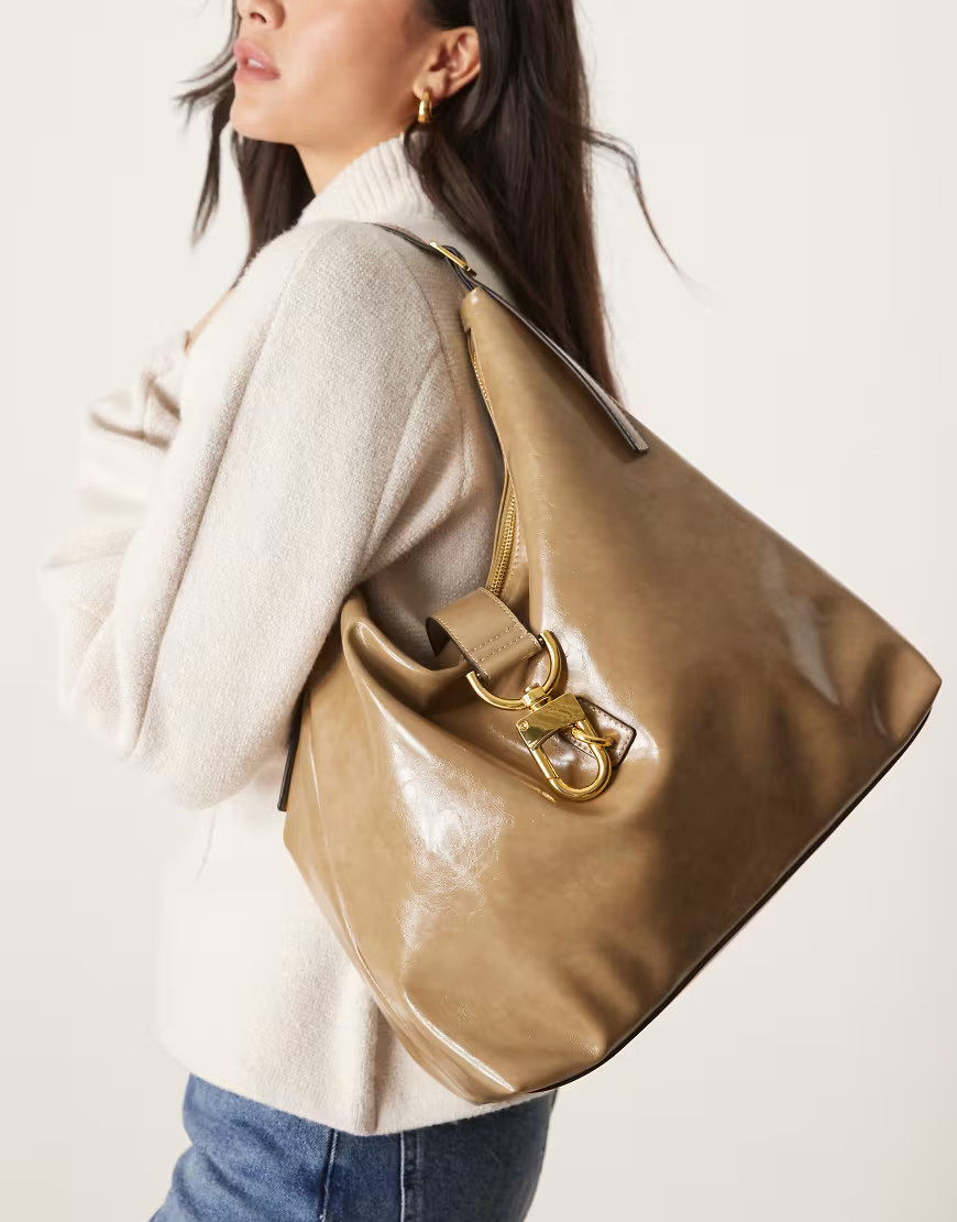 ASOS DESIGN statement buckle slouch tote bag in light Khaki-Green | ASOS (Global)