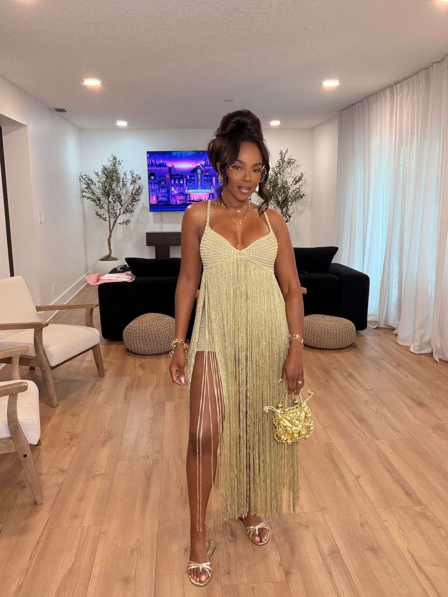 Hi babes!

This fringe statement look is that bold, unforgettable moment — the movement, shimmer, and texture instantly make this outfit feel elevated and luxe without even trying.

Where to wear this:
Birthday dinners
Vacation nights
Girls night
Special events

I love pieces like this because even though it’s such a statement, you can still style it different ways with heels, layered jewelry, or a blazer — so your cost per wear keeps getting better every time you bring it out.

Everything is linked below

xx Kira | Kira’s Fashion Finds

34D - 27 - 40 | size small or 4