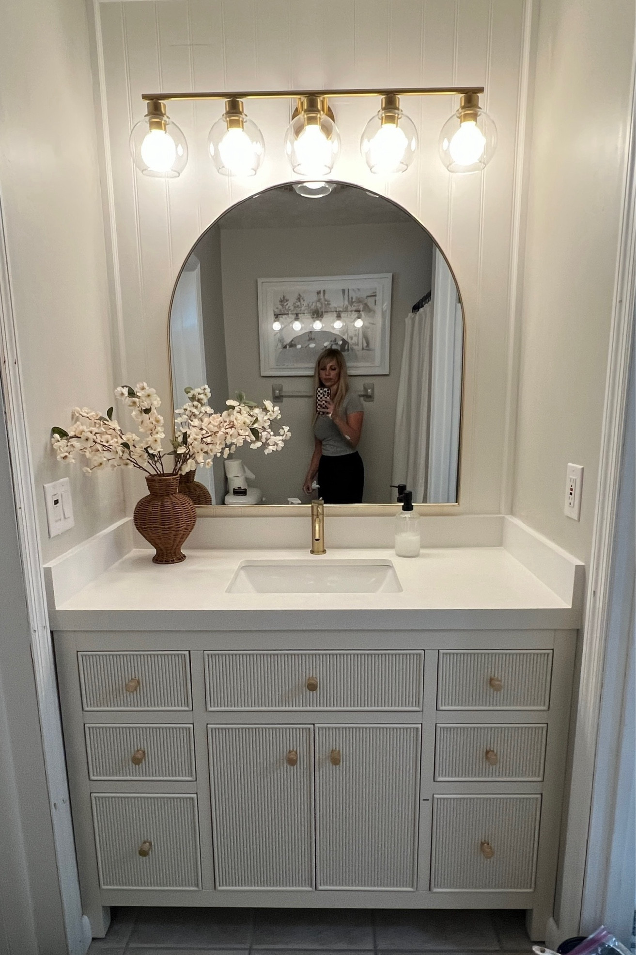 Linking the light fixture from Amazon , and other items. The vanity is from Willow bath and vanity. Mirror is from home goods but I’ve linked similar options. 

#LTKHome #LTKFindsUnder100