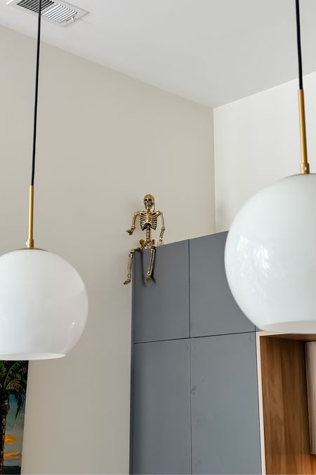 We’ve got a gold skeleton on top of our kitchen cabinets! 

#LTKhome #LTKSeasonal #LTKHalloween